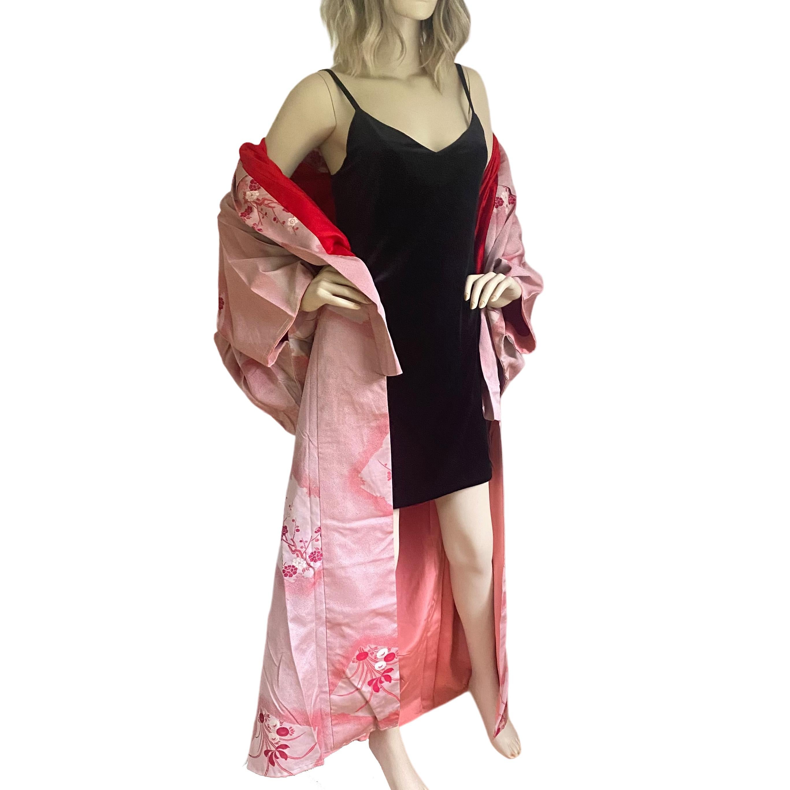 Circa: MEIJI period 1890
Place of Origin: Japan
Material: Substantial Silk brocade
Condition: excellent.
Red silk brocade kimono is hand-sewn and made in Japan.
Exquisite design of sakura (cherry blossom) branches  
Red silk lining.
Rare important
