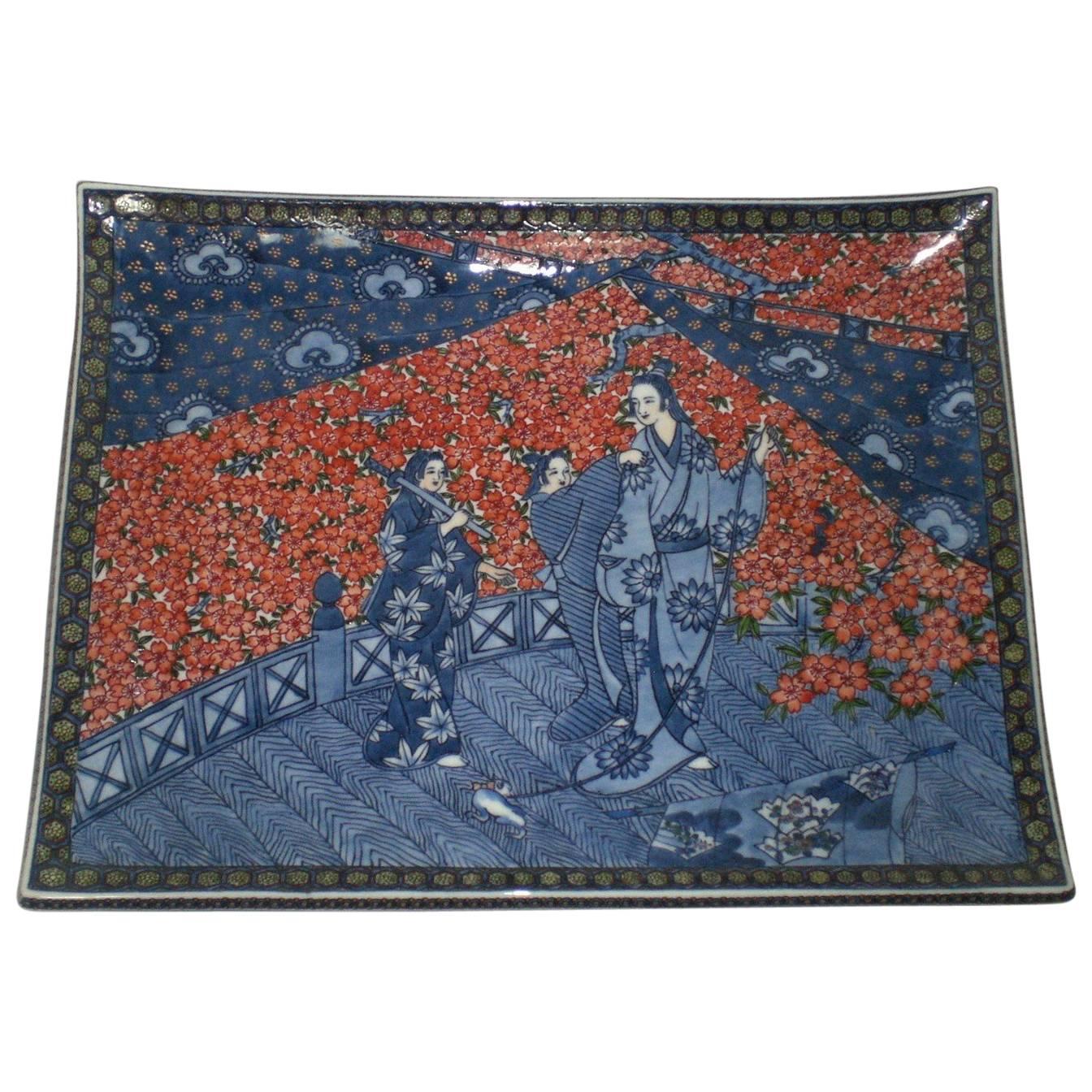 Mesmerizing Japanese contemporary museum quality highly collectible decorative porcelain rectangular charger, extremely intricately gilded and hand painted in blue and red, a signed masterpiece by highly acclaimed master porcelain artist of the