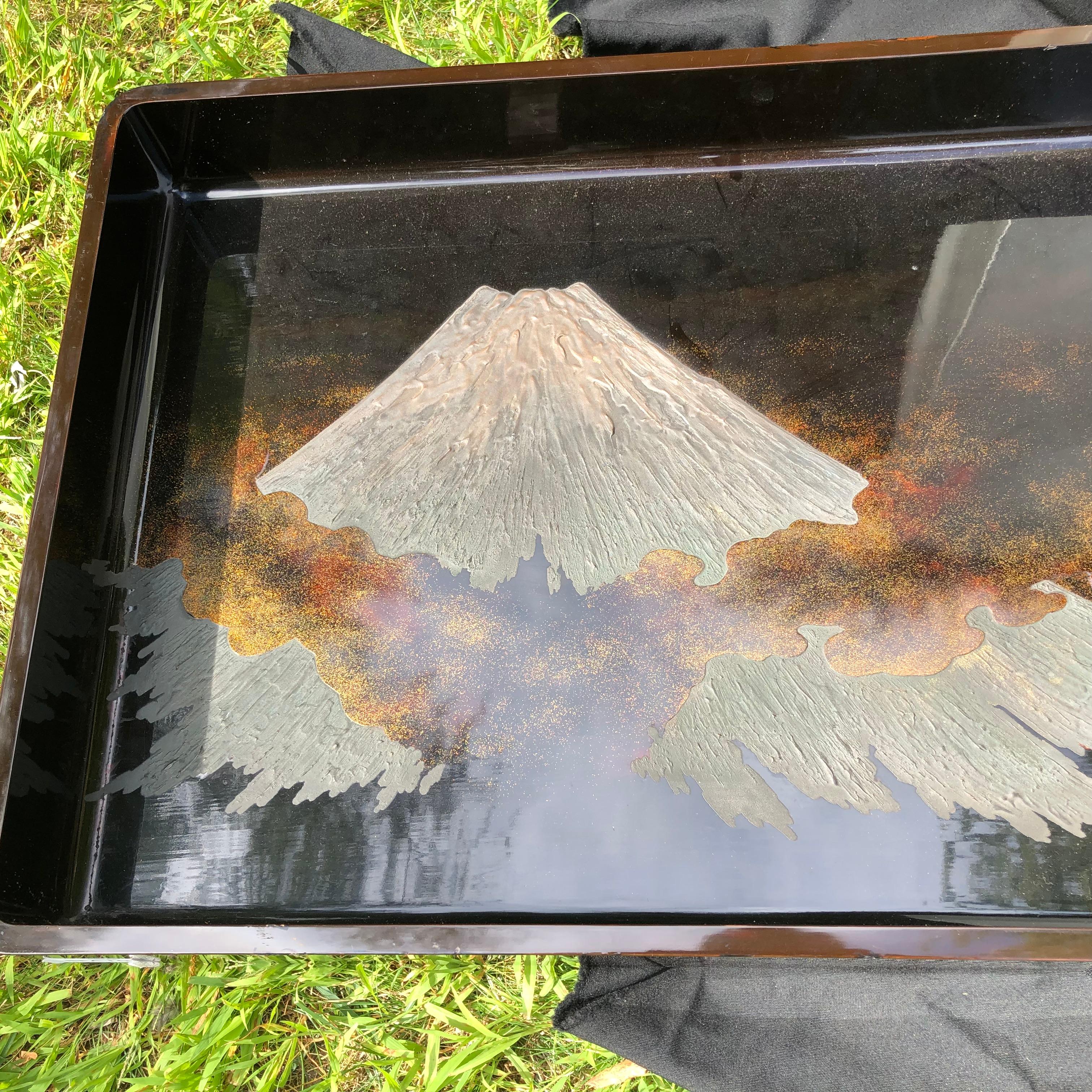 From our recent Japanese acquisition travels

Mount Fuji has never before been depicted so beautifully.

This is superb Japanese handmade and hand lacquered serving tray or wall art piece crafted in rich and famous 30 layer lacquers from Wakasa