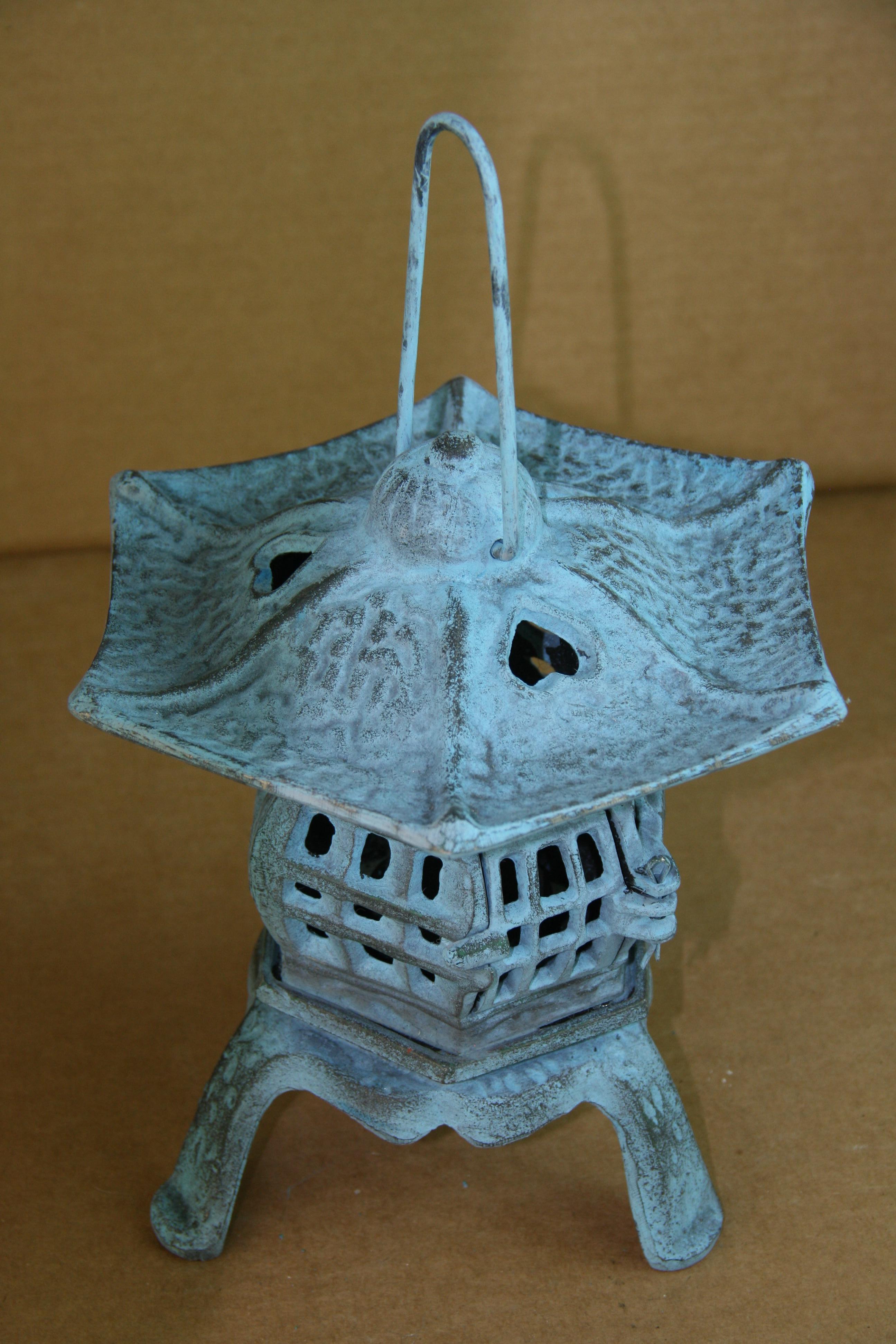 3-724 Hand cast Japanese candle lantern with hearts on top
Height to top of lantern 10