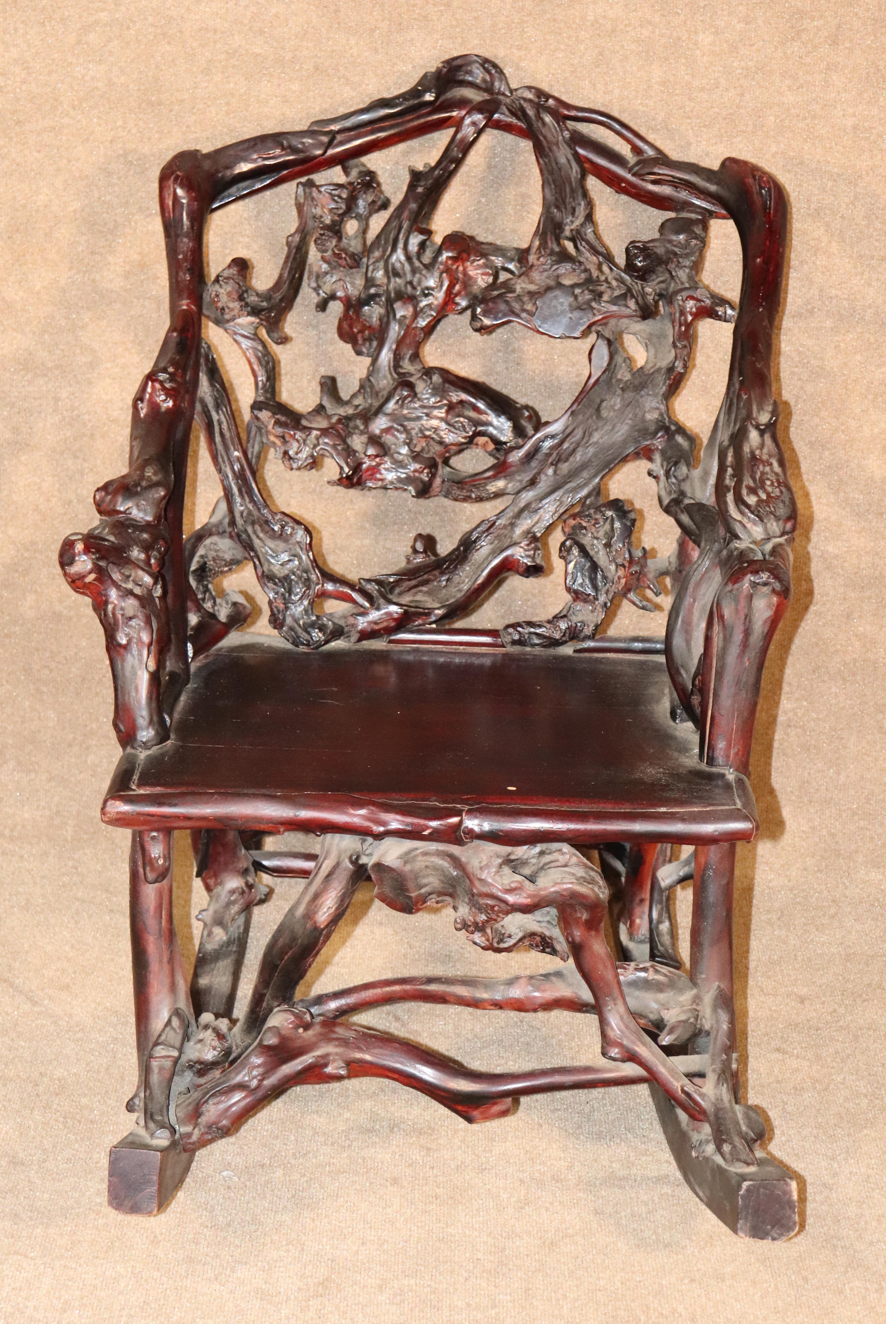 Japanese style rocking chair made of carved fruitwood. Artistic chair for home or office.
Please confirm location.