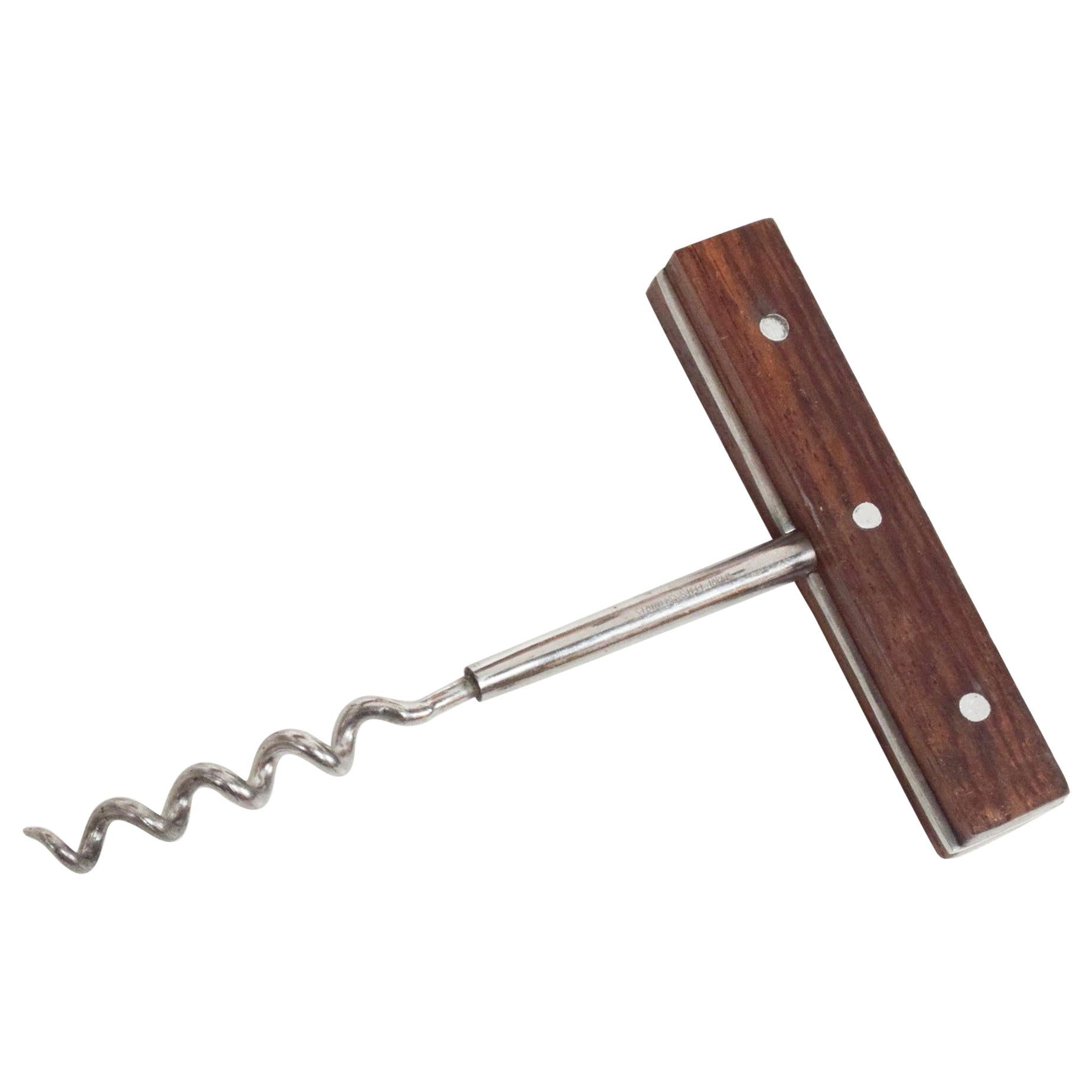 Bottle Opener
Japanese Modern Wine Bar Accessory Corkscrew Bottle Opener 
Designed in Stainless Steel with Rosewood. Circa 1960s
Stamped JAPAN
Original chrome-plated finish. Unrestored preowned vintage condition.
Measures: 4.88 x 3.5 x .63