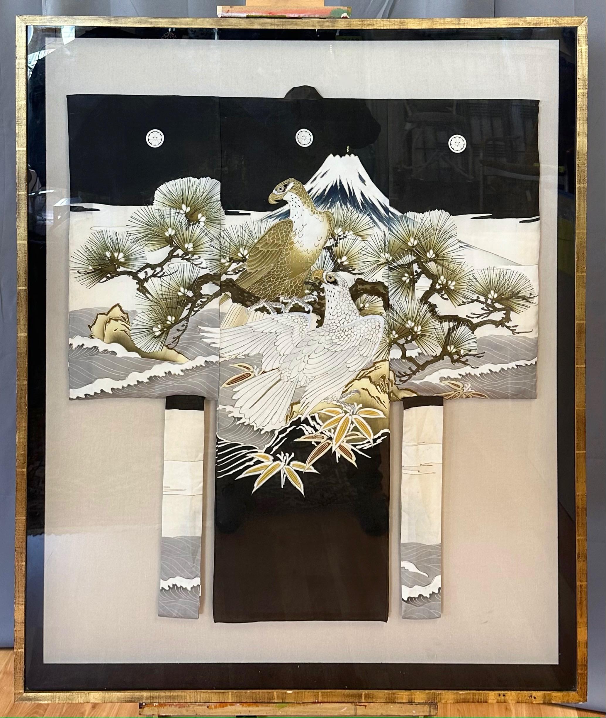 A majestic late 1980s Japanese Showa period Sakai clan hand-painted, dyed, and embroidered silk kimono with eagles and Mt. Fuji in a monumental custom-made silk-lined giltwood frame.

Features an epic and incredibly well executed hand-painted,