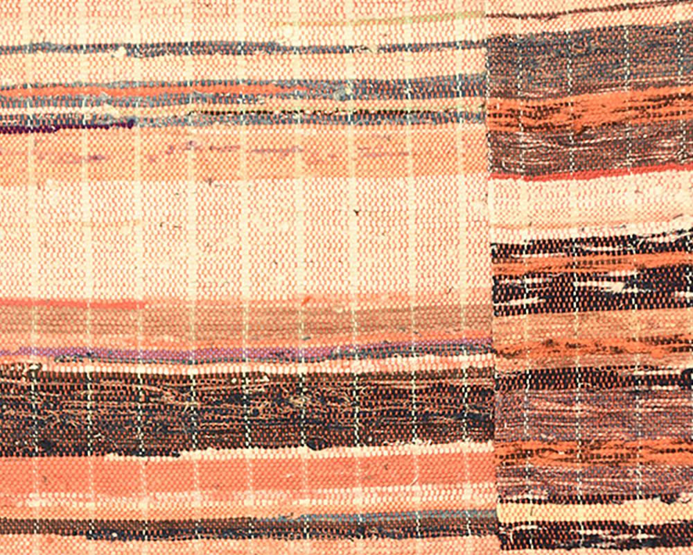 This rug or blanket is handmade using the 'saki-ori' weaving technique which incorporates a recycled rag weft (often made from shredded kimono and other garments), with a cotton warp. Saki, means 'tear' or 'rip' and Ori means 'weaving'.