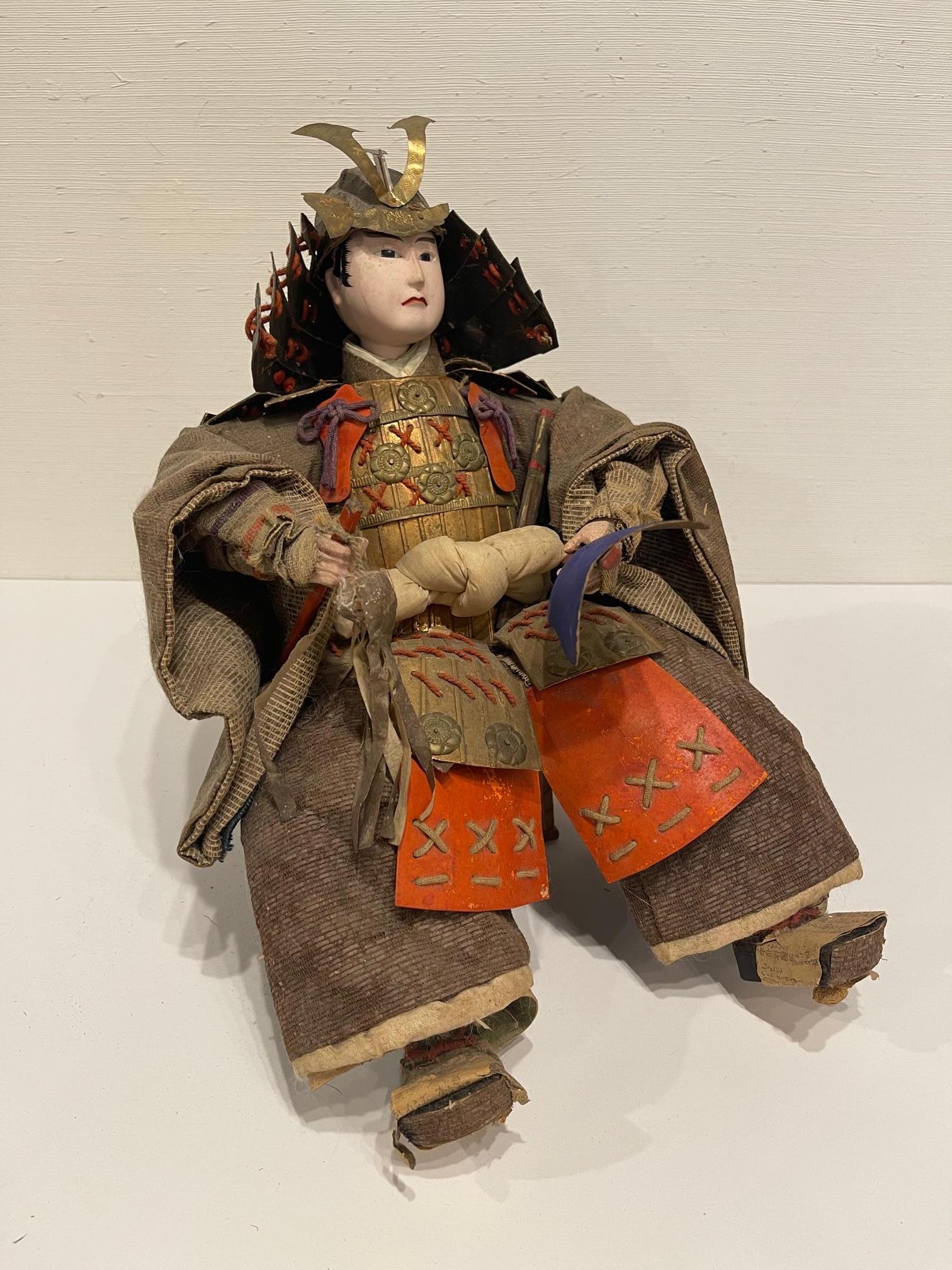 Japanese Samurai doll or figure, Meiji period, Circa 1870s. Beige and brown jacket colors.
  