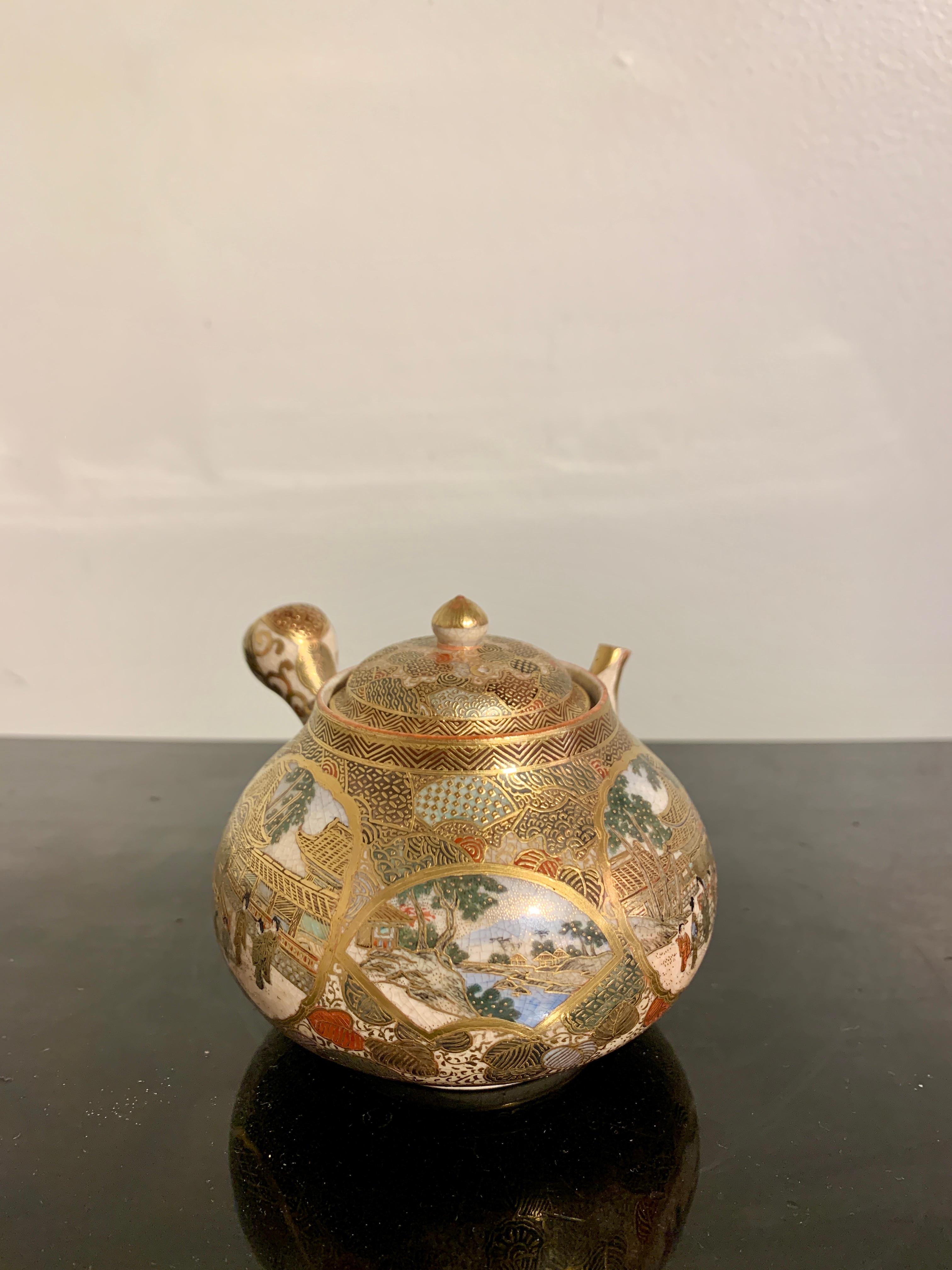 A finely decorated Japanese Satsuma yokode teapot by Senshu, Meiji Period, late 19th century, Japan.

The small teapot of pleasing form and elegant proportions, featuring a globular body tapering slightly at the shoulders, a small spout, and a