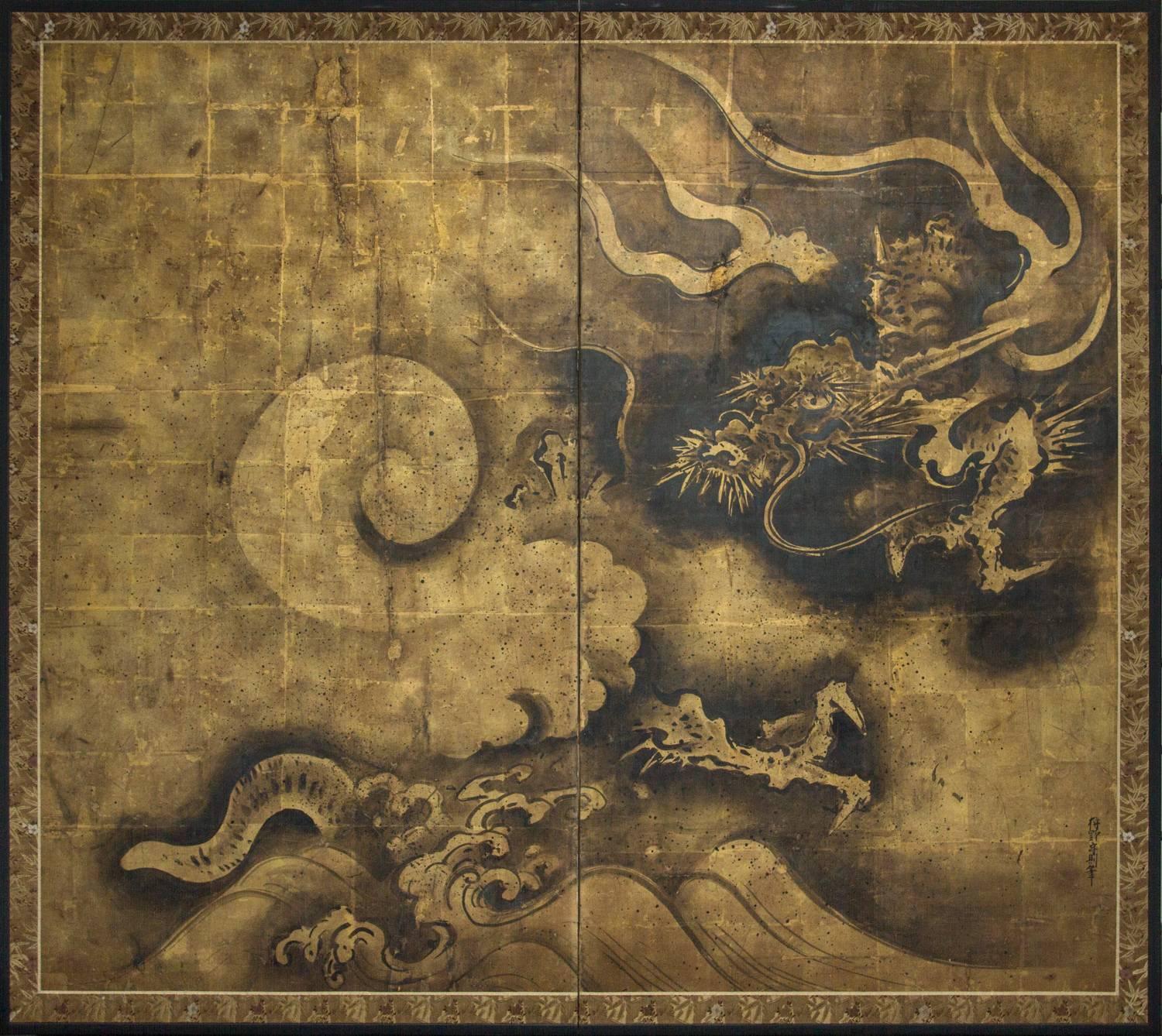Bold and skillful painting of a dragon in the mist over crashing waves.  Painted in ink on beautifully patinated gold leaf with a silk brocade border.  Signature reads: Kano Morinori.