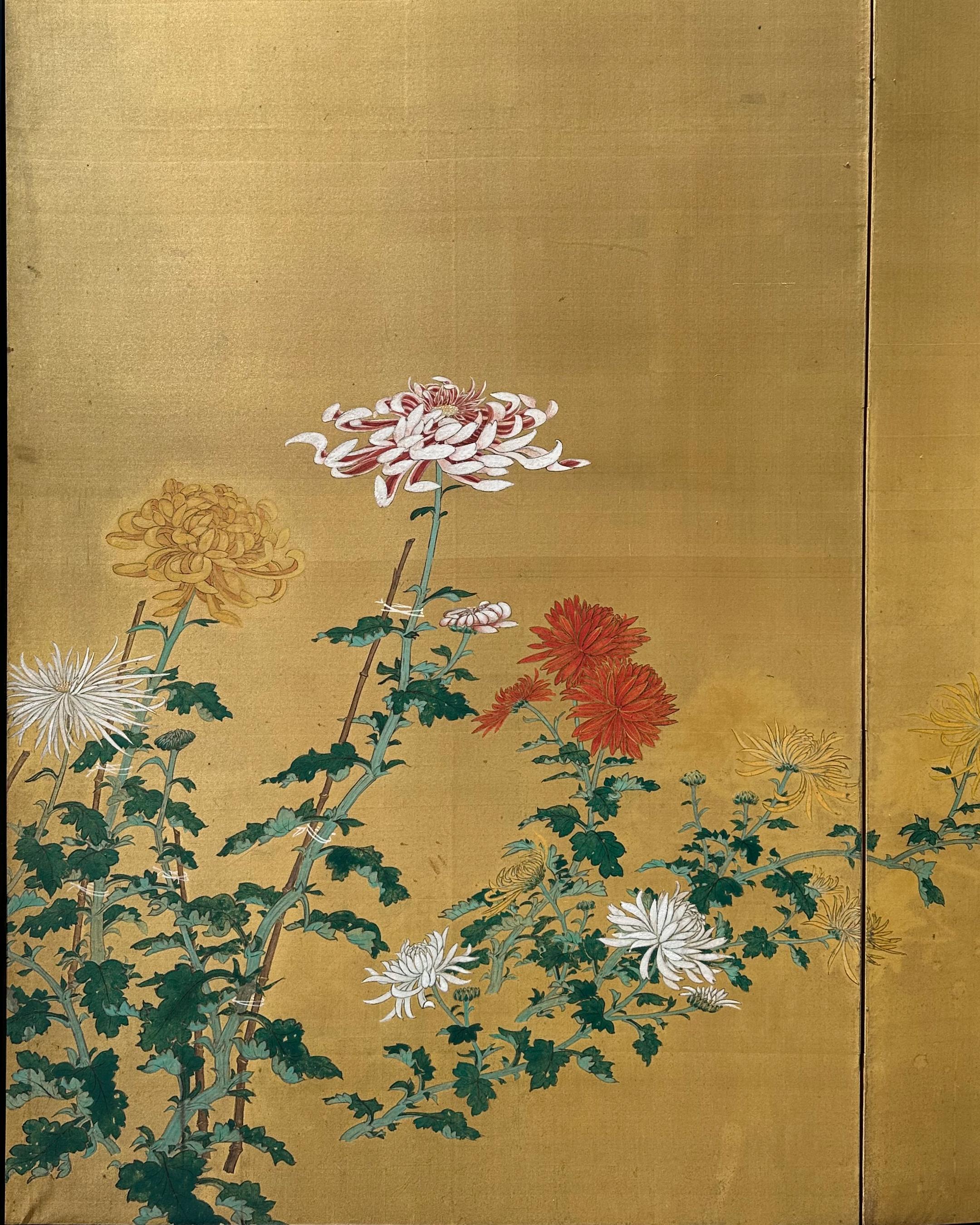 Echo of Chrysanthemums captures the quiet dialogue between form and reflection. Against a radiant gold-leaf ground, blooming chrysanthemums rise in graceful color harmony — white, crimson, and ochre — while their faint mirrored silhouettes seem to