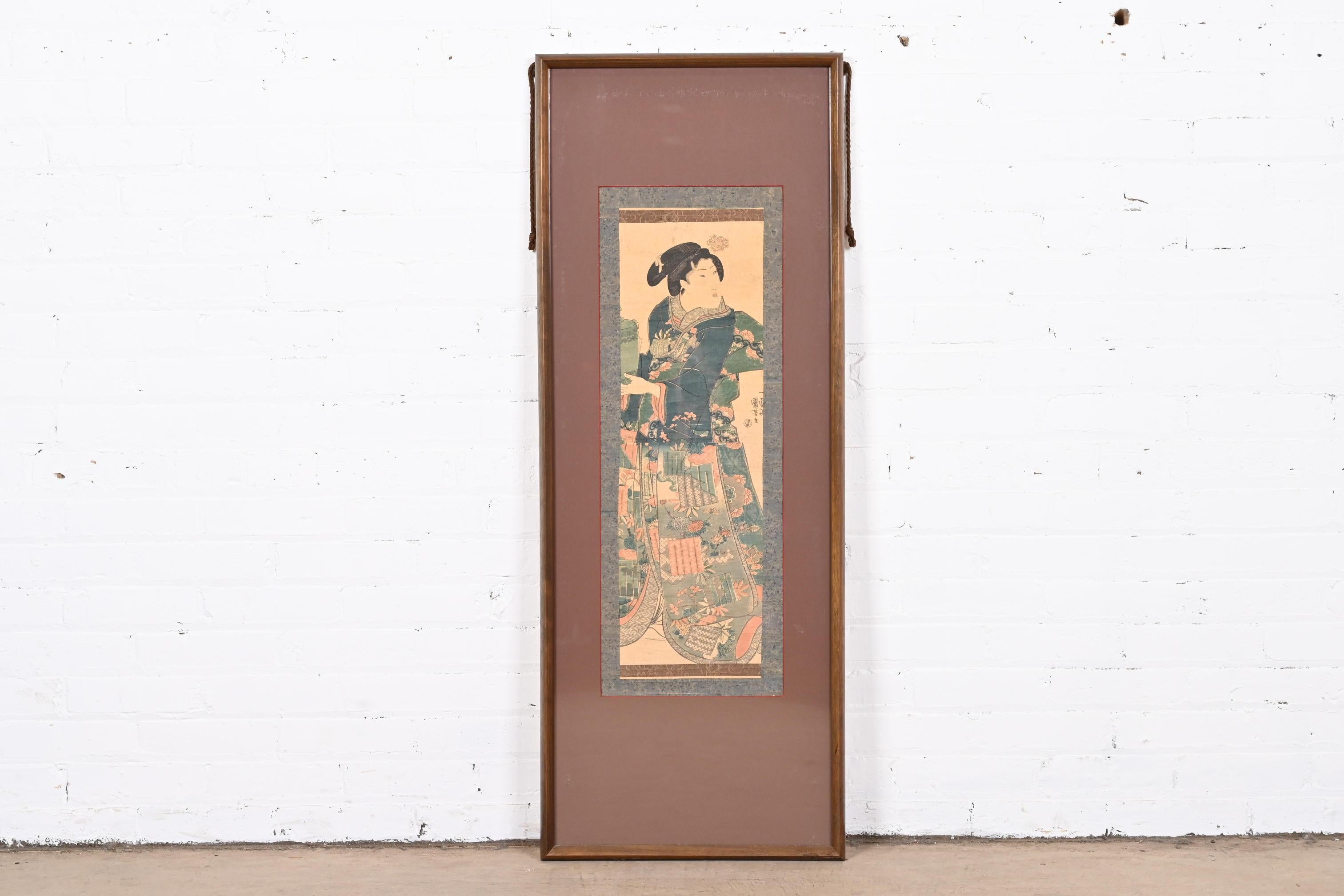 A beautiful vintage framed and matted Japanese scroll painting of a woman carrying a vase

Recently procured from Frank Lloyd Wright's DeRhodes House

Japan, Early 20th Century

Measures: 17.88