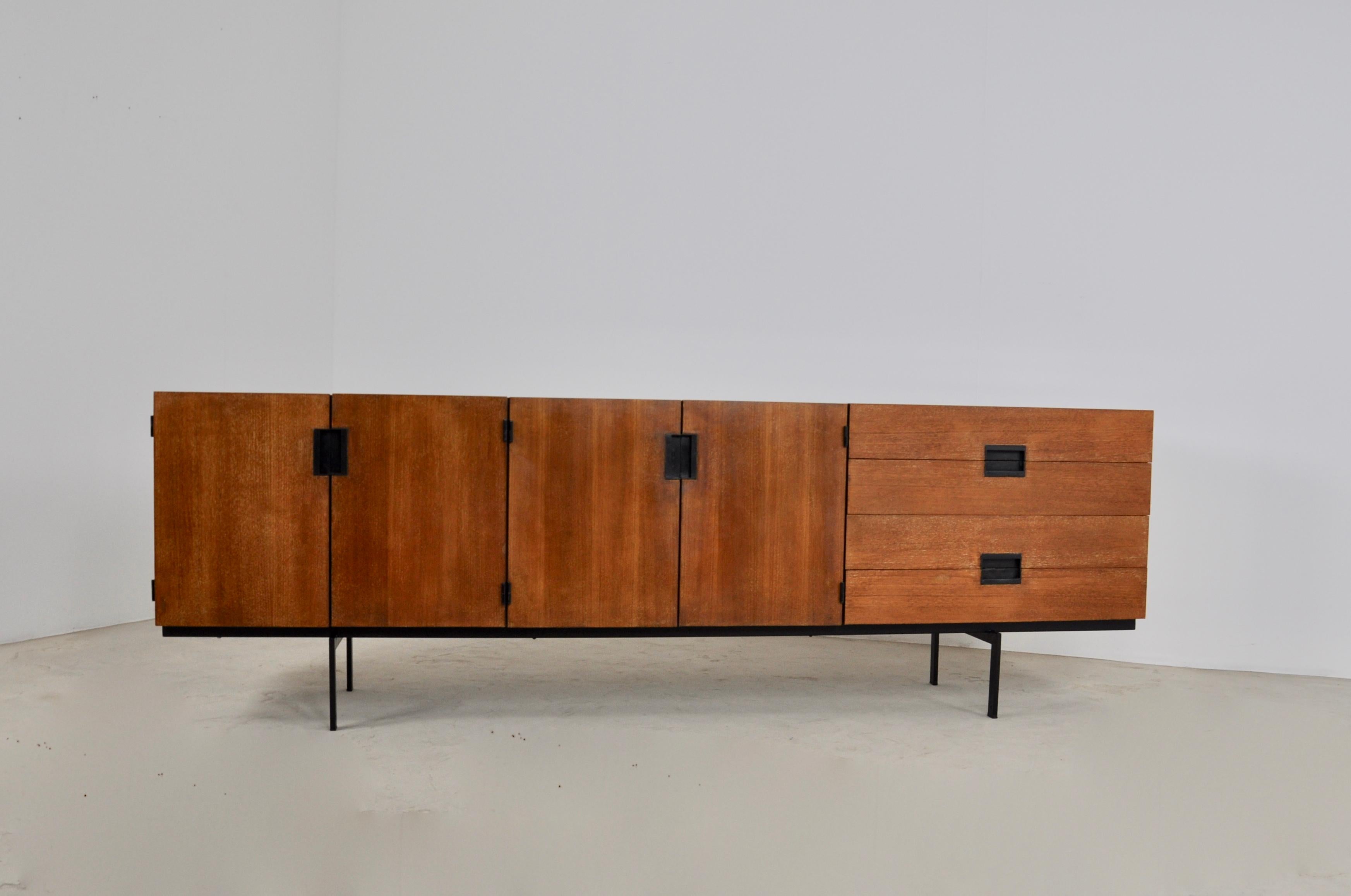 Sideboard composed of 4 doors, 4 drawers. Black metal base. Wear due to time and the age of the furniture.