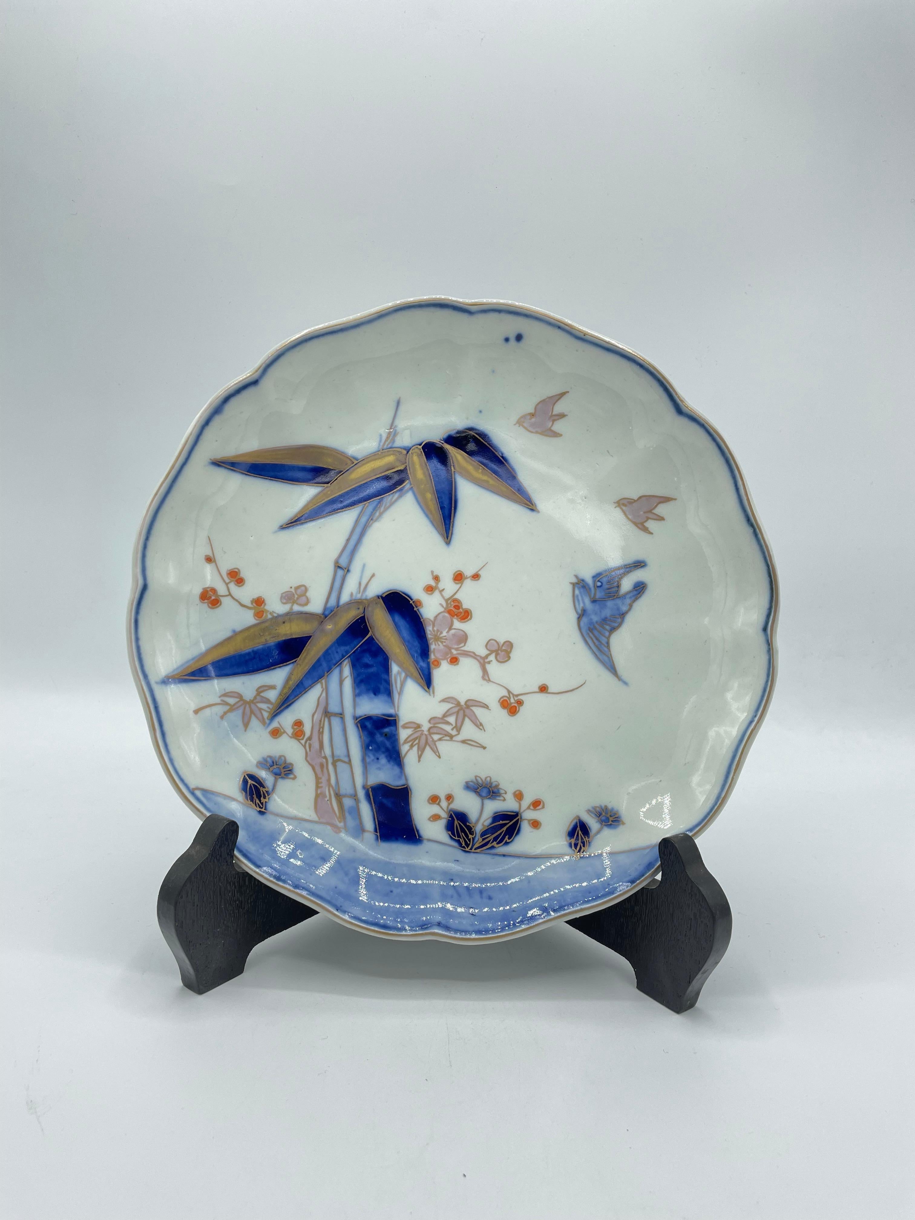 This plate was made in Japan around 1980s in Showa era.
The material is porcelain and the design is some bamboo and birds.
It can be used as decoration and also serving. 

Dimensions:22 x 22 x H3.5 cm

Pottery and porcelain (tōjiki, also yakimono,