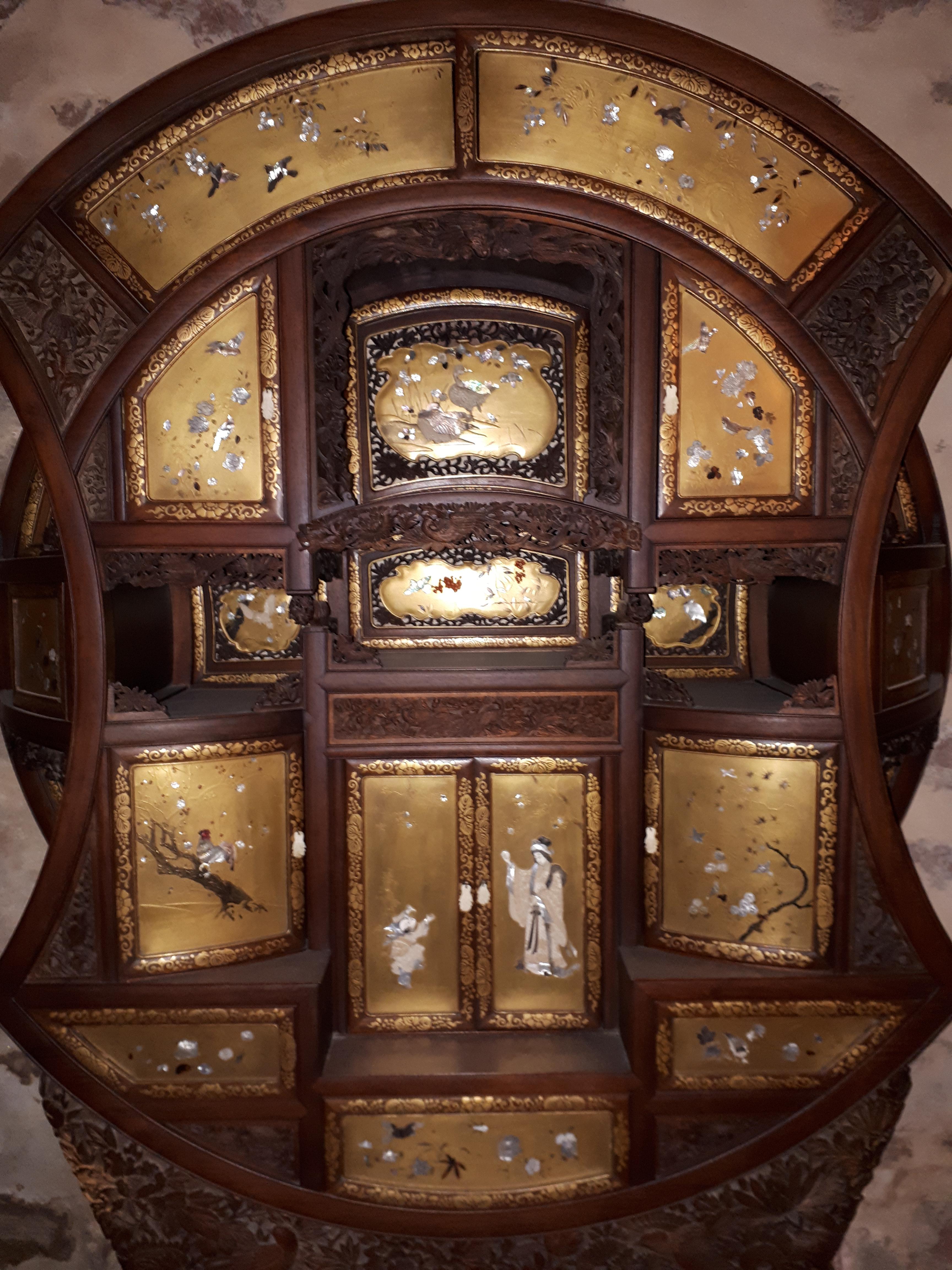 Very rare Japanese Shibayama cabinet with multiple leaves, drawers and sliding panels. Indeed, the quality of sculpture, the variety of materials (ivory, mother-of-pearl, but also brown horn and coral), the backgrounds of the panels finely executed