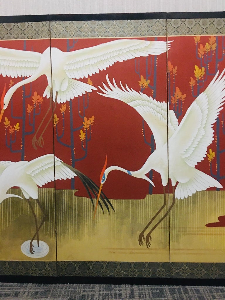 Japanese Showa period four panel folding screen finely painted with a theme of cranes in four elegant positions. The piece is signed and was made in circa 1950 in Japan.
In great vintage condition with age-appropriate wear and use.
  
