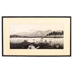 Impression japonaise sur bois signée représentant un lac en bord de montagne