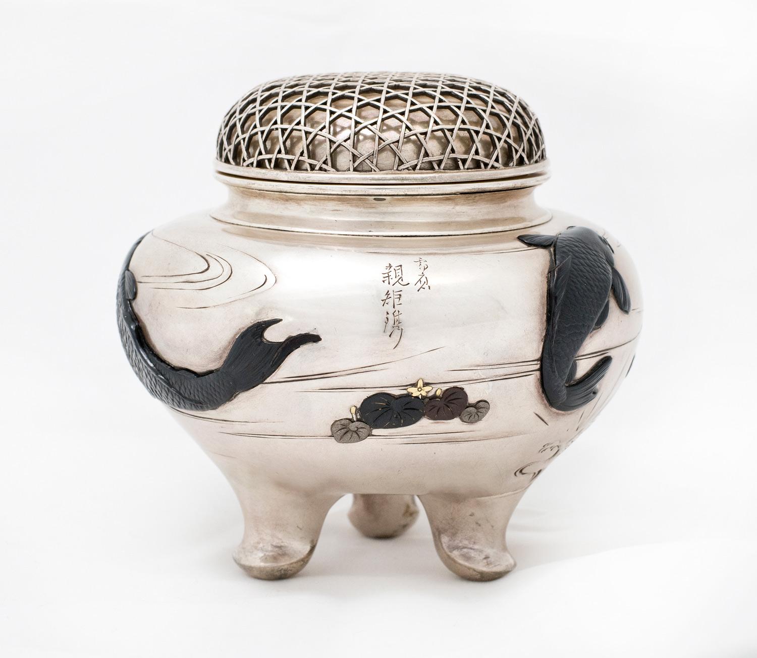 As part of our Japanese works of art collection we are delighted to offer this super quality Meiji Period 1868-1912, pure silver and mixed metal koro or incense burner, the heavy silver body stands upon a three legged base and has been cast with