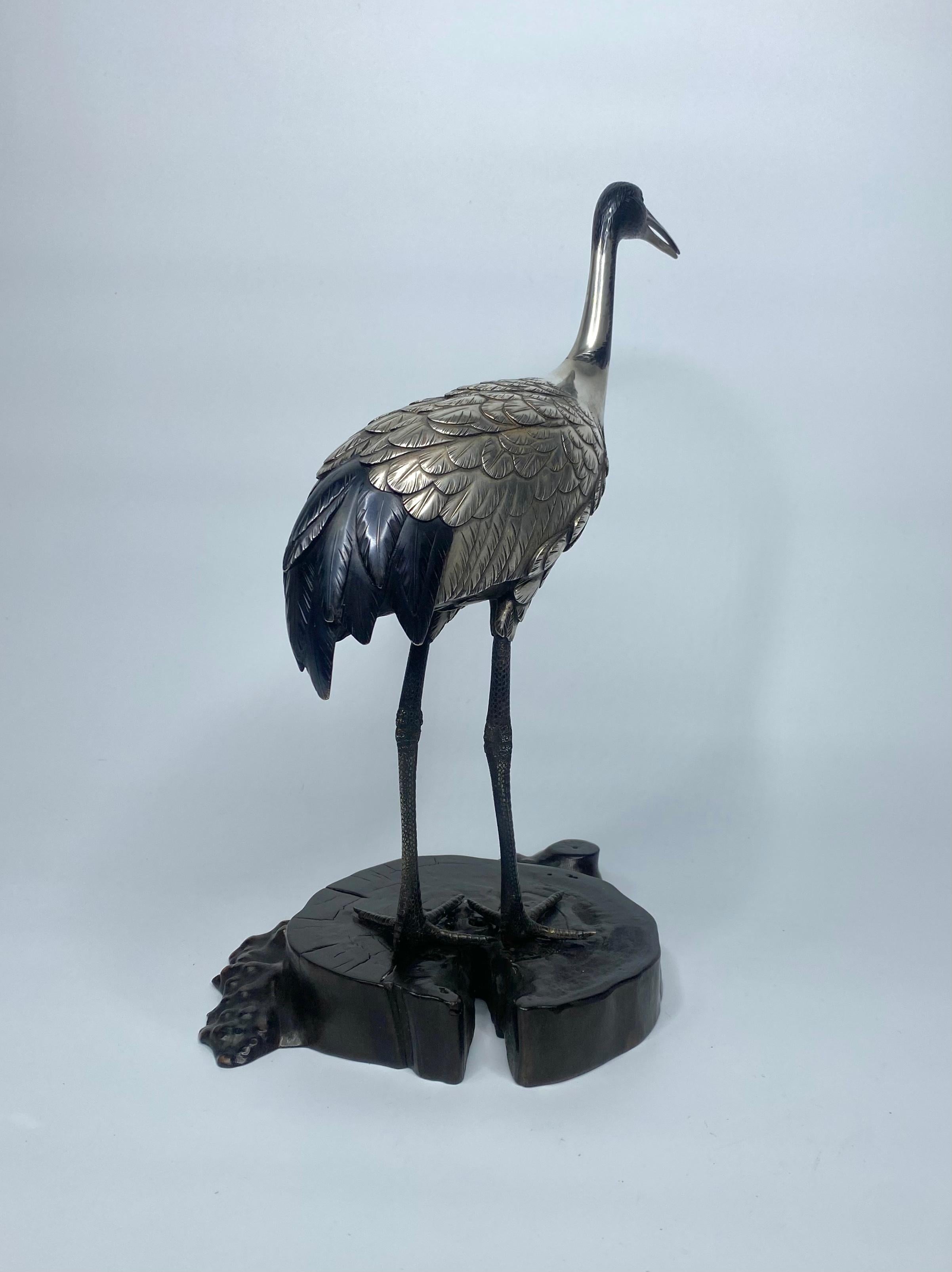 Japanese silvered bronze manchurian crane, Hidenao, Meiji Period.

£3,900.00
Japanese bronze and mixed metal okimono of a Manchurian Crane, signed Hidenao, Meiji Period. The finely cast bronze Crane, modelled, standing upon a shaped wood base,