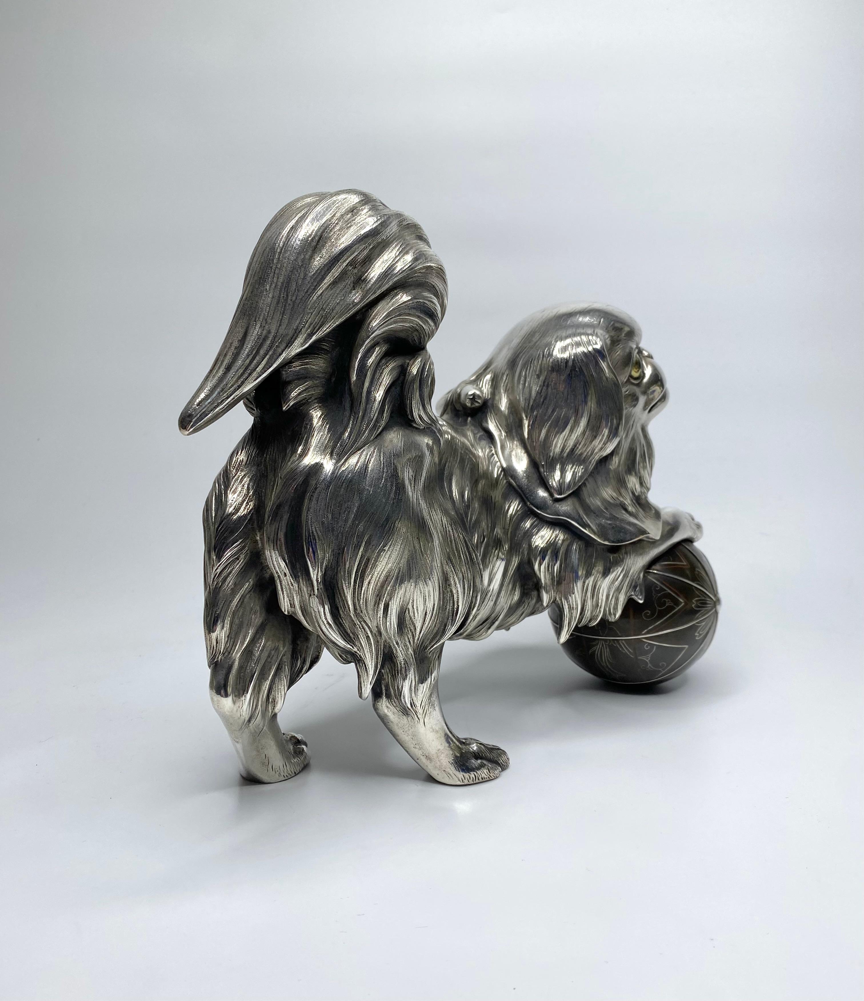 Cast Japanese silvered bronze okimono of a Chin puppy, Meiji Period.