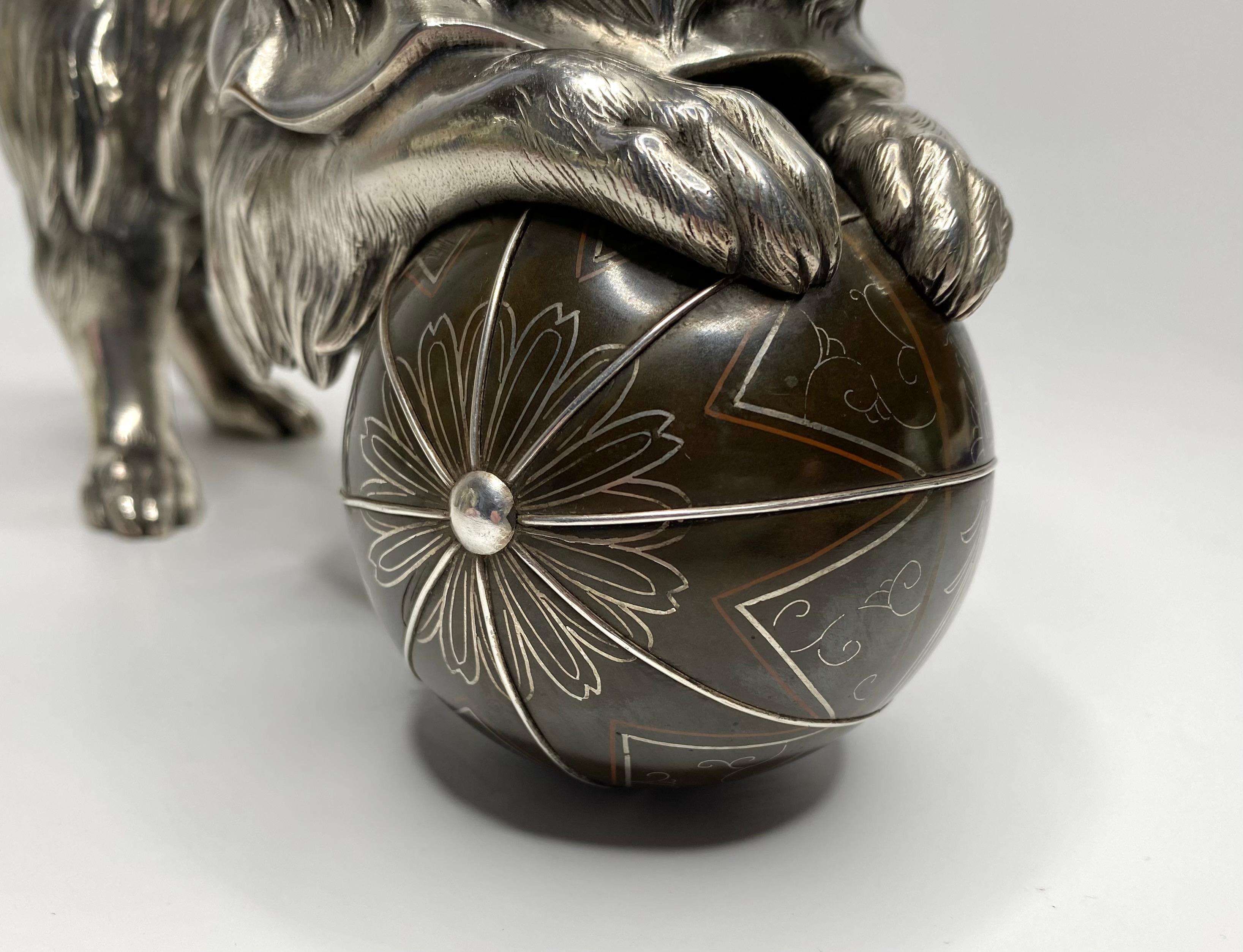 Bronze Japanese silvered bronze okimono of a Chin puppy, Meiji Period.
