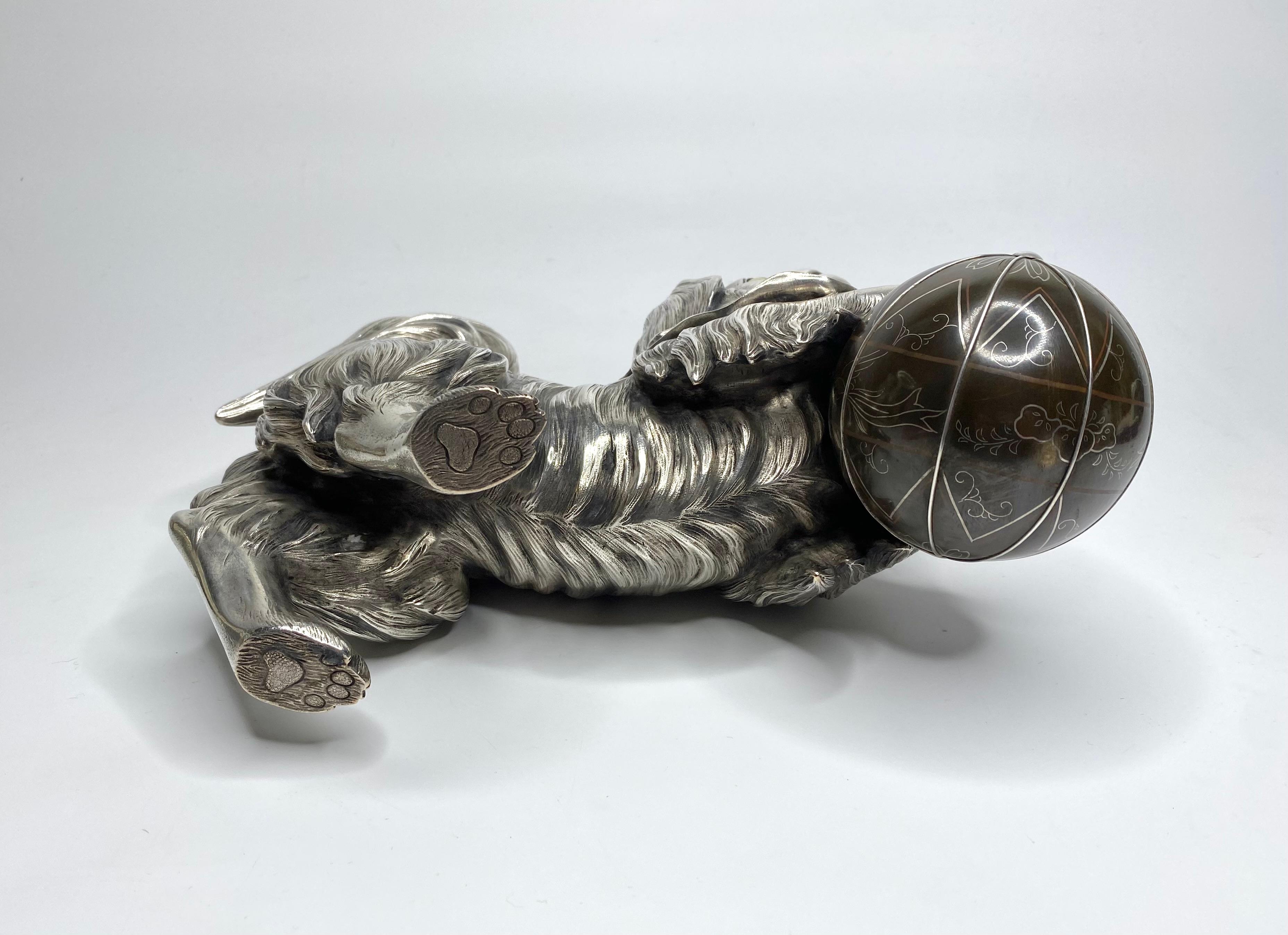 Japanese silvered bronze okimono of a Chin puppy, Meiji Period. 1
