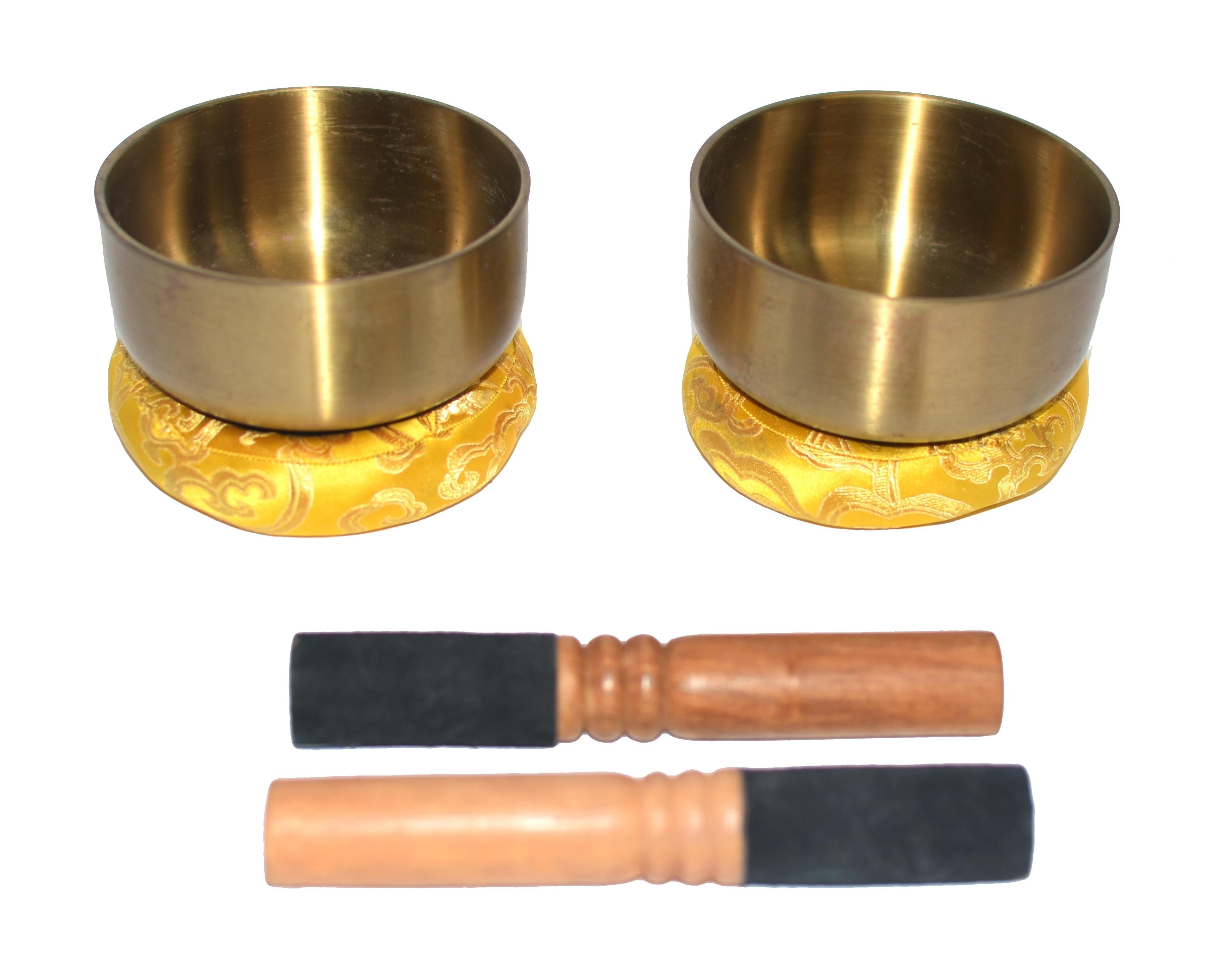 A pair of rare, 20th century, solid golden brass Japanese singing bowls of D6 tone. The upright design and plain surface reflect modern sophistication while the crisp tone conjures up the feeling of joy. A beautiful, single character of the word