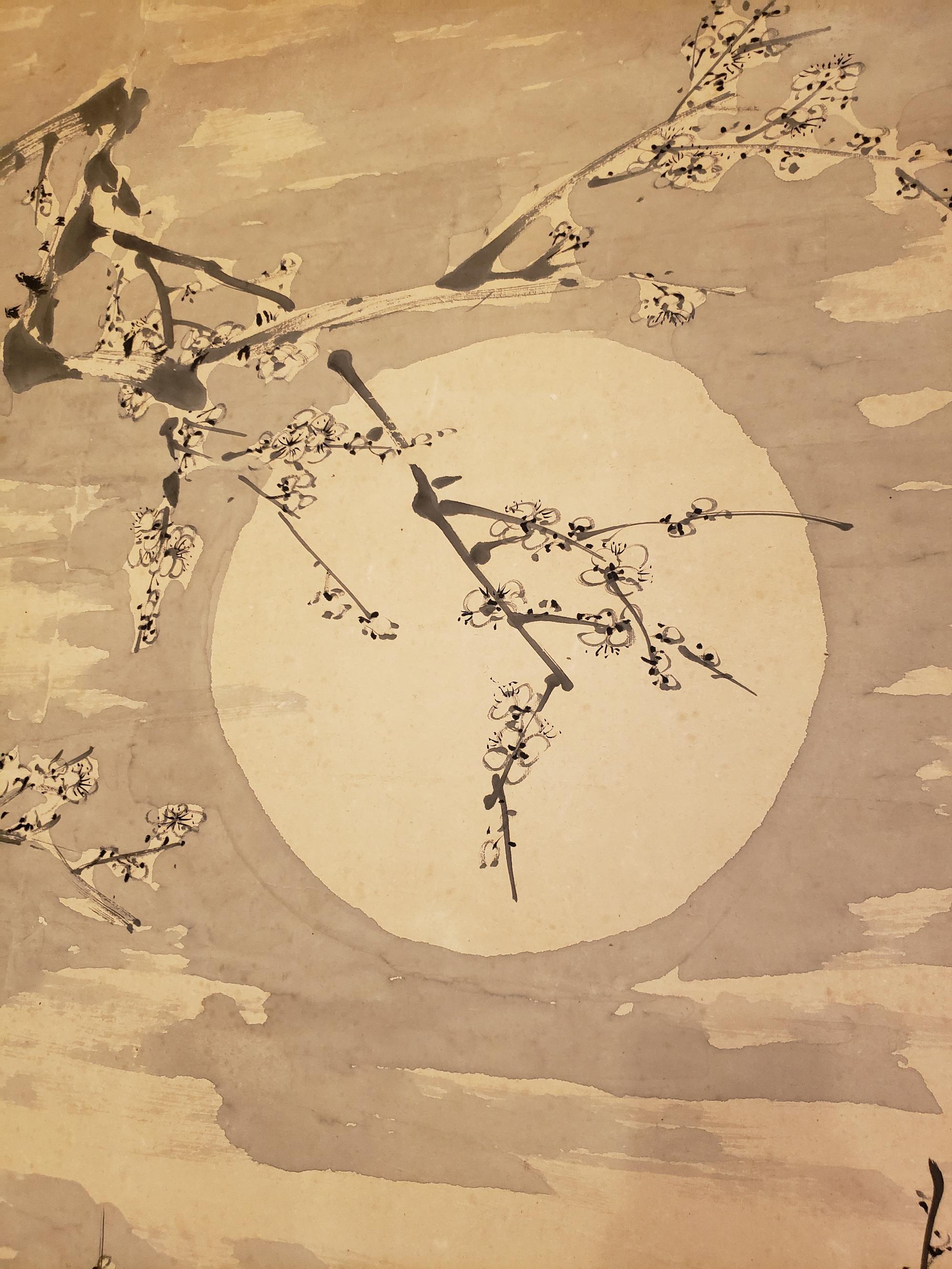 Meiji period (1868-1912) ink painting of plum branches in bloom against a full moon with calligraphy. The calligraphy is a poem about winter. Signature reads: Matsuura Ryosai, Dated: 1890. Ink on paper, framed.