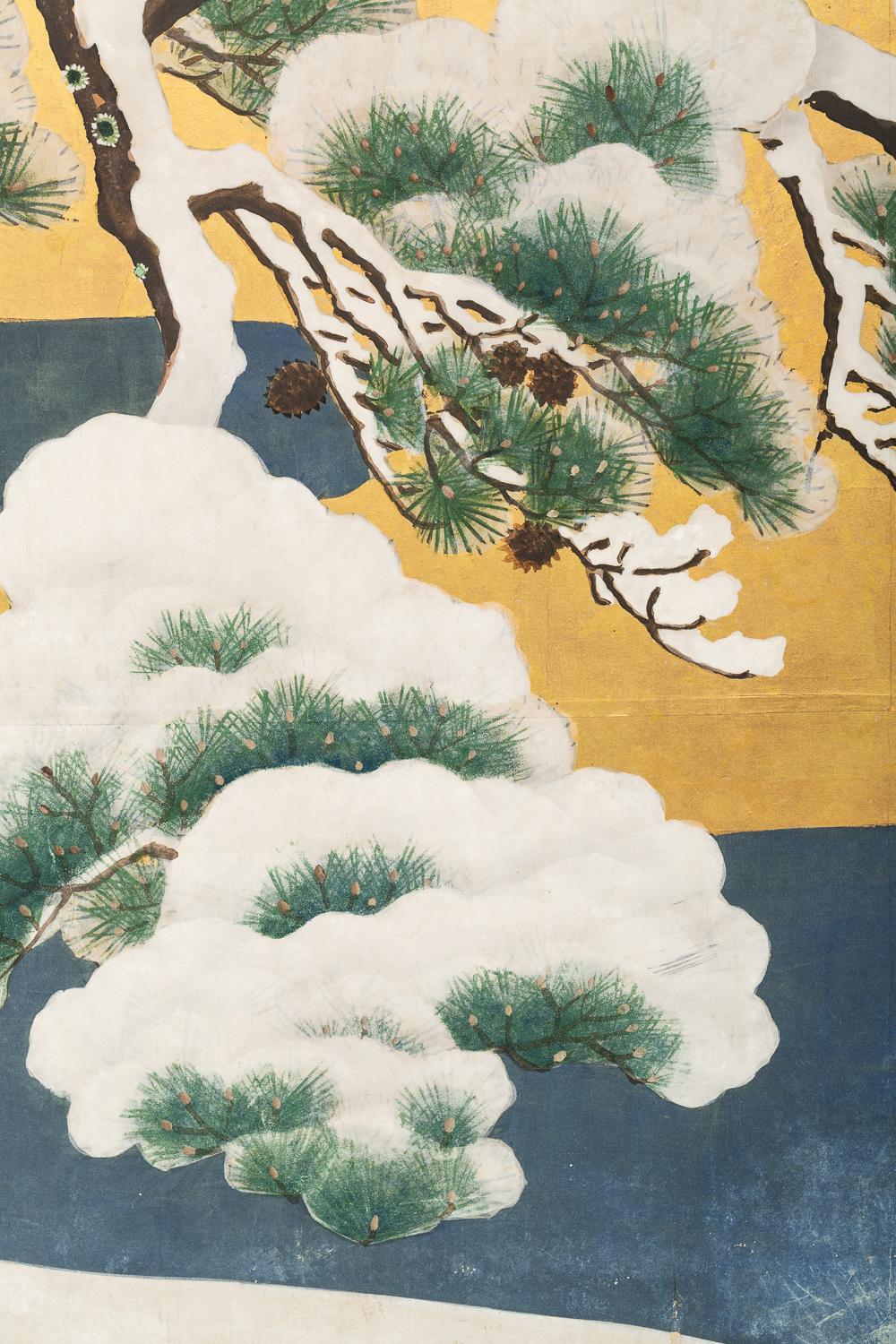 Kano school painting of a pheasant in a snowy pine. Artist signature reads: Hokkyo Shunyo. Mineral pigments on gold leaf with silk brocade border.
 