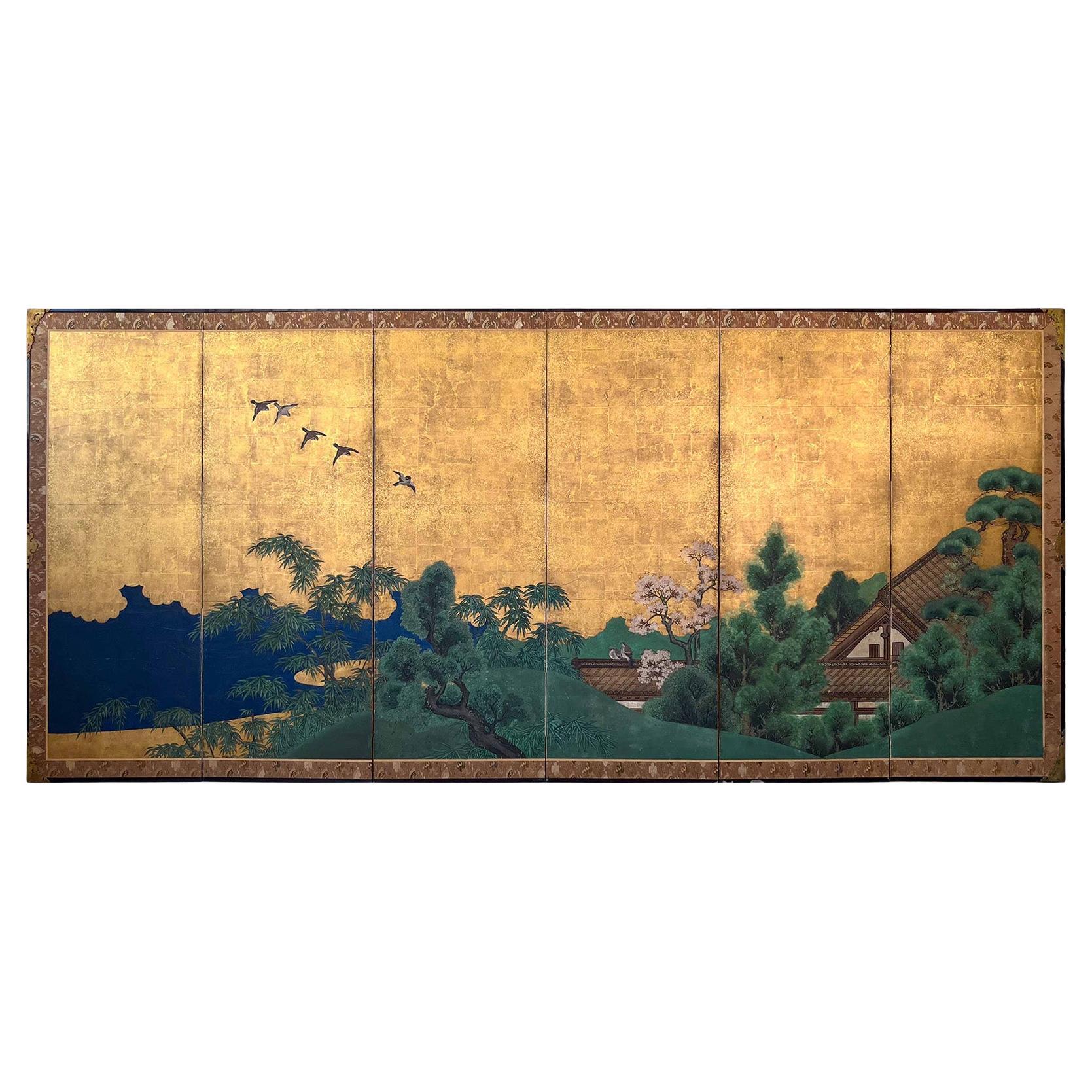 Japanese six-panel folding screen with gold-leaf depicting an idyllic landscape