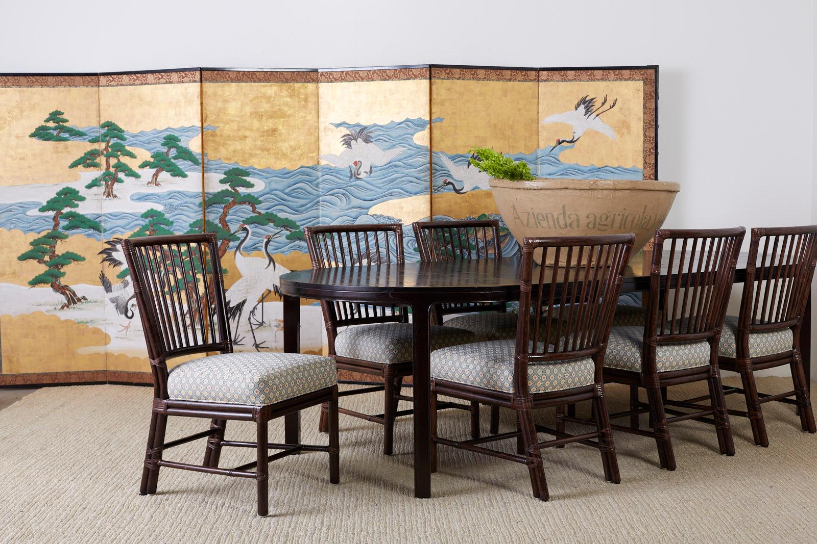 Spectacular 19th century Japanese Meiji period six-panel screen depicting hamamatsu pines with eight large Red Crowned cranes or Manchurian cranes on the sea shore. Made in the Nihonga school style. Ink and color pigments on delicate squares of gold