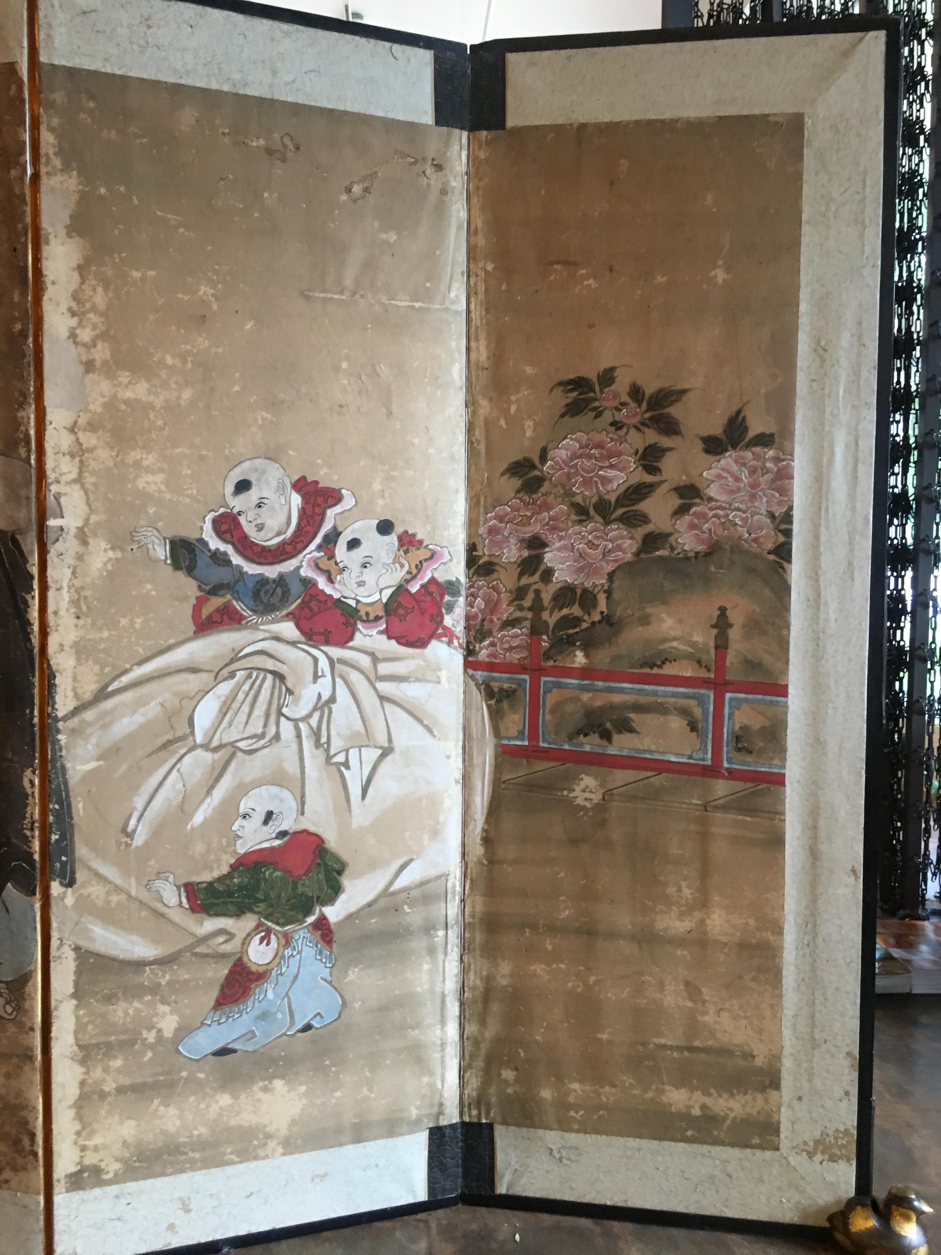 A delightful Japanese six panel painted paper screen featuring the beloved figure Hotei, Edo Period, early 19th century. 

Hotei, called Budai in China, and known as the Laughing Buddha or Fat Buddha in the West, is considered to be an emanation