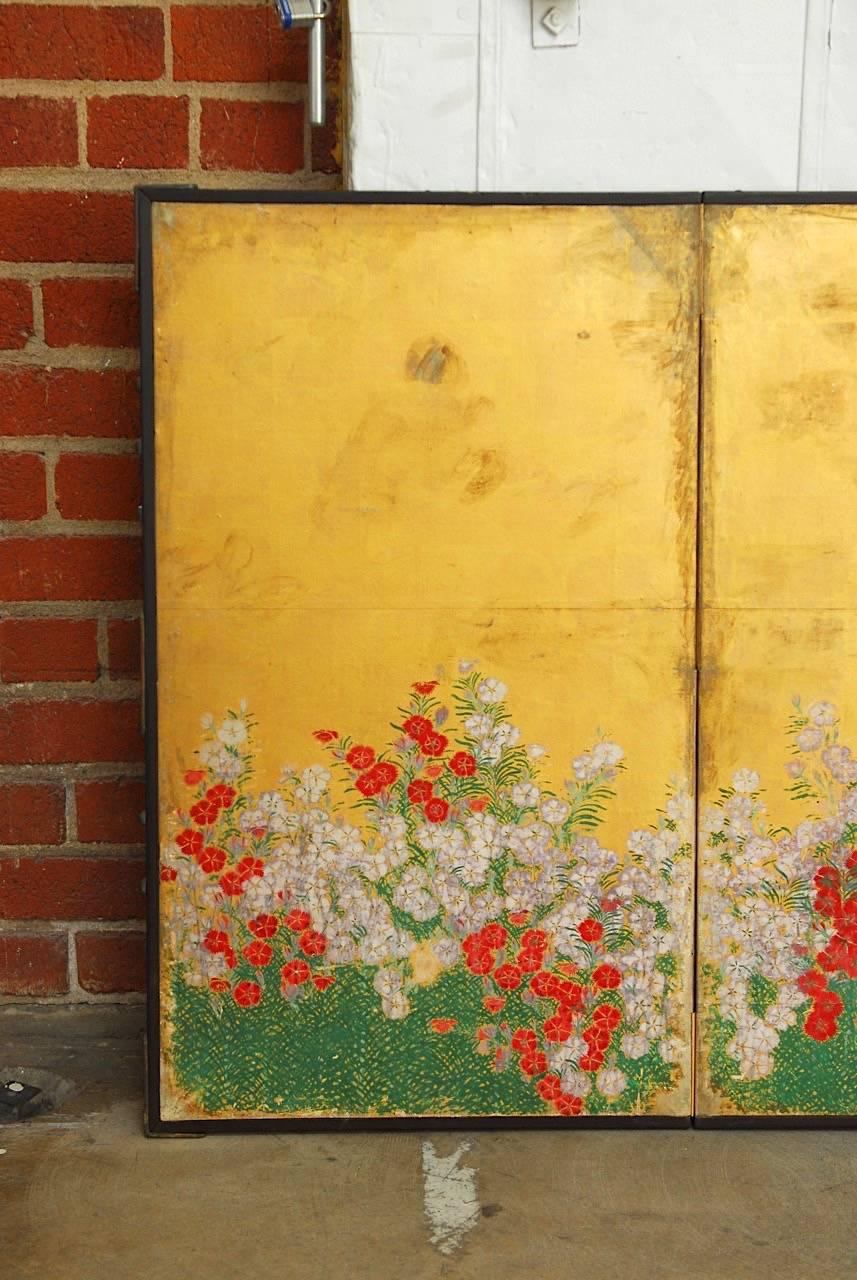 Ebonized Japanese Six Panel Spring Blossoms on Gold Leaf Screen