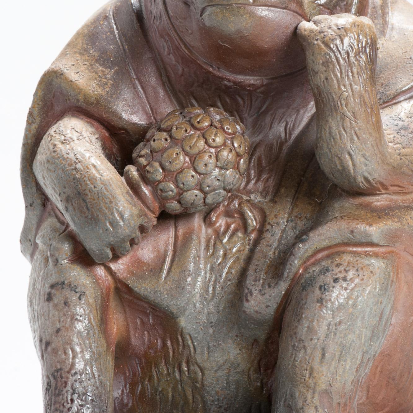 1932- bizen pottery of a sitting Monkey. Marked at the back.

Real name is Mitsuo. Eldest son of Koyama Gengo, pen name is Koyama Isso. Worked for a local brickmaking company but later studied ceramics craftsmanship under his father. Recipient of