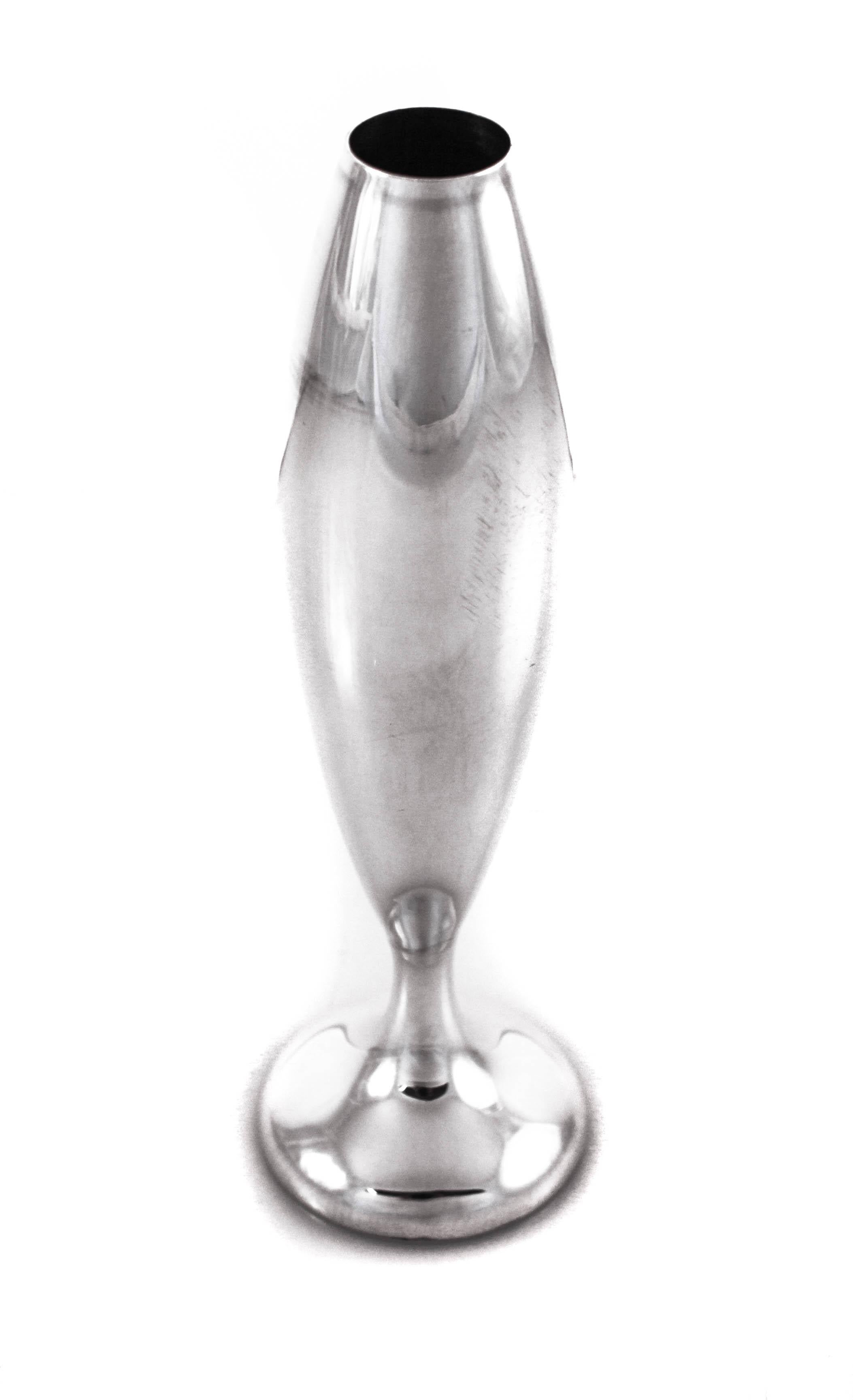 These sterling silver bud vases were made in Japan by the Toshikazu Silver Company. The Japanese are world renowned for being detail oriented and sticklers for precision. These vases are simple in detail and do not have ornamentation but their very