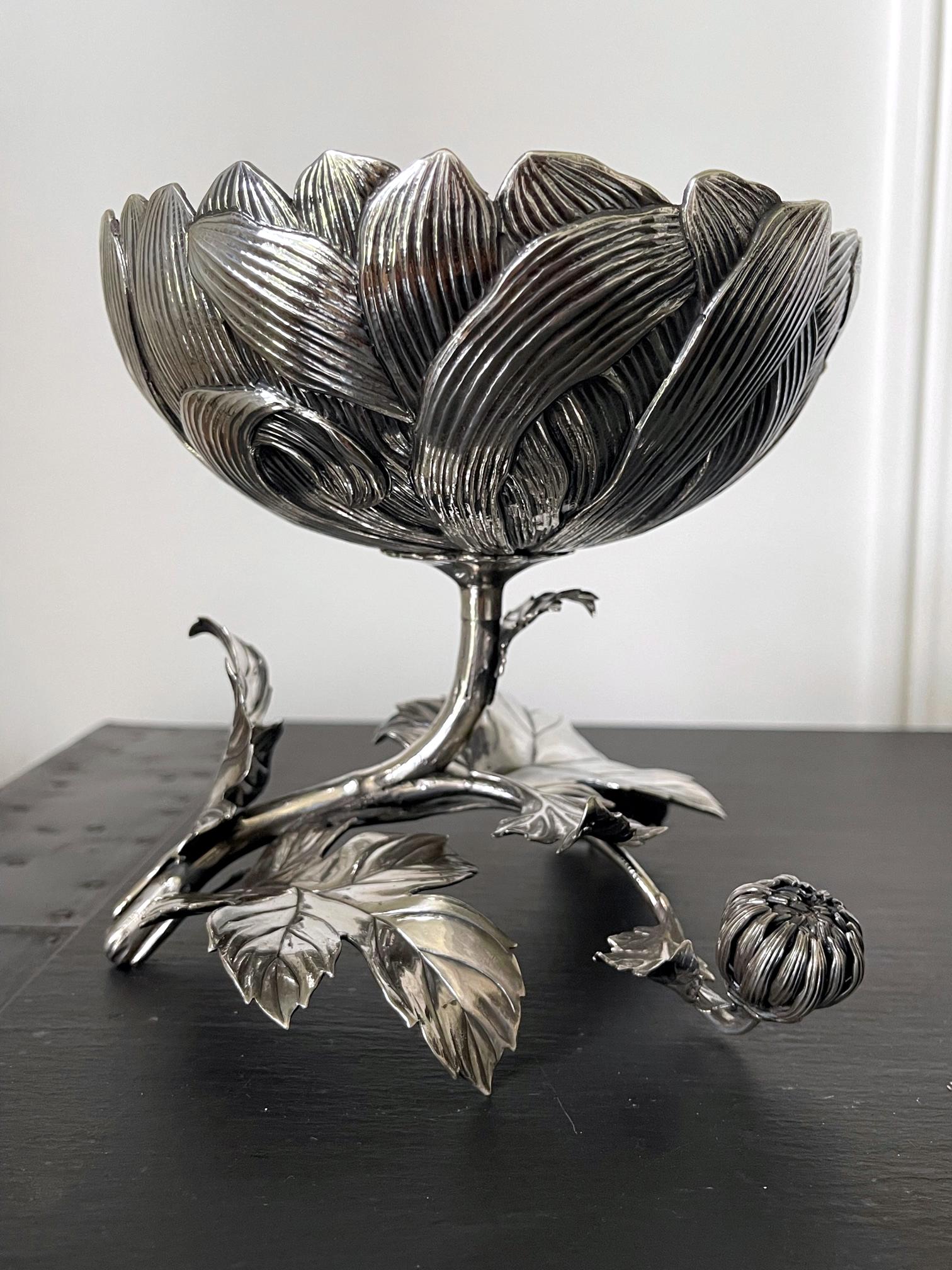 An exquisite Japanese sterling silver ornamental bonbon dish, circa 1890-1900. The piece was rendered in the shape of a stemmed branch of chrysanthemum blossom and was made for export market. Both botanically realistic and stylish, the piece