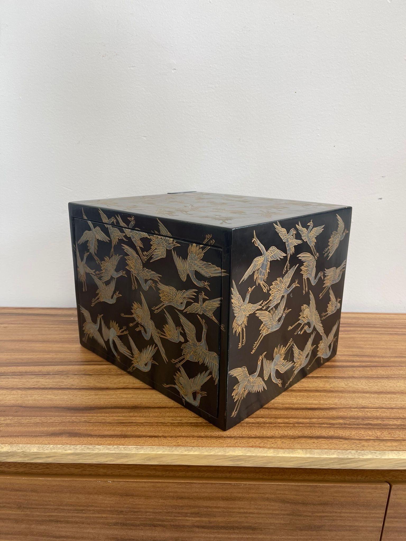 Mid-Century Modern Japanese Storage Box With Hidden Compartments and Crane Motif.