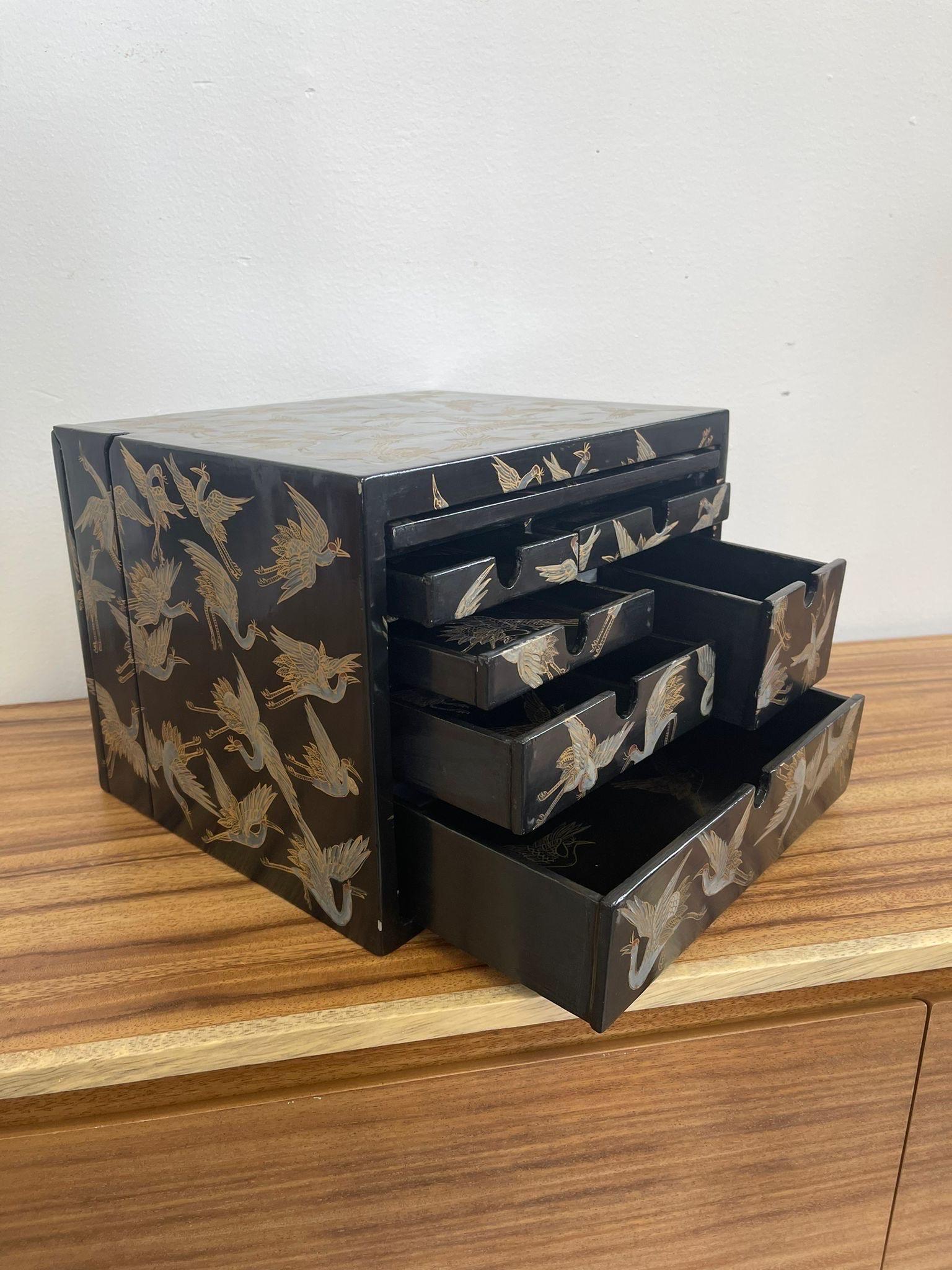 Japanese Storage Box With Hidden Compartments and Crane Motif. 1