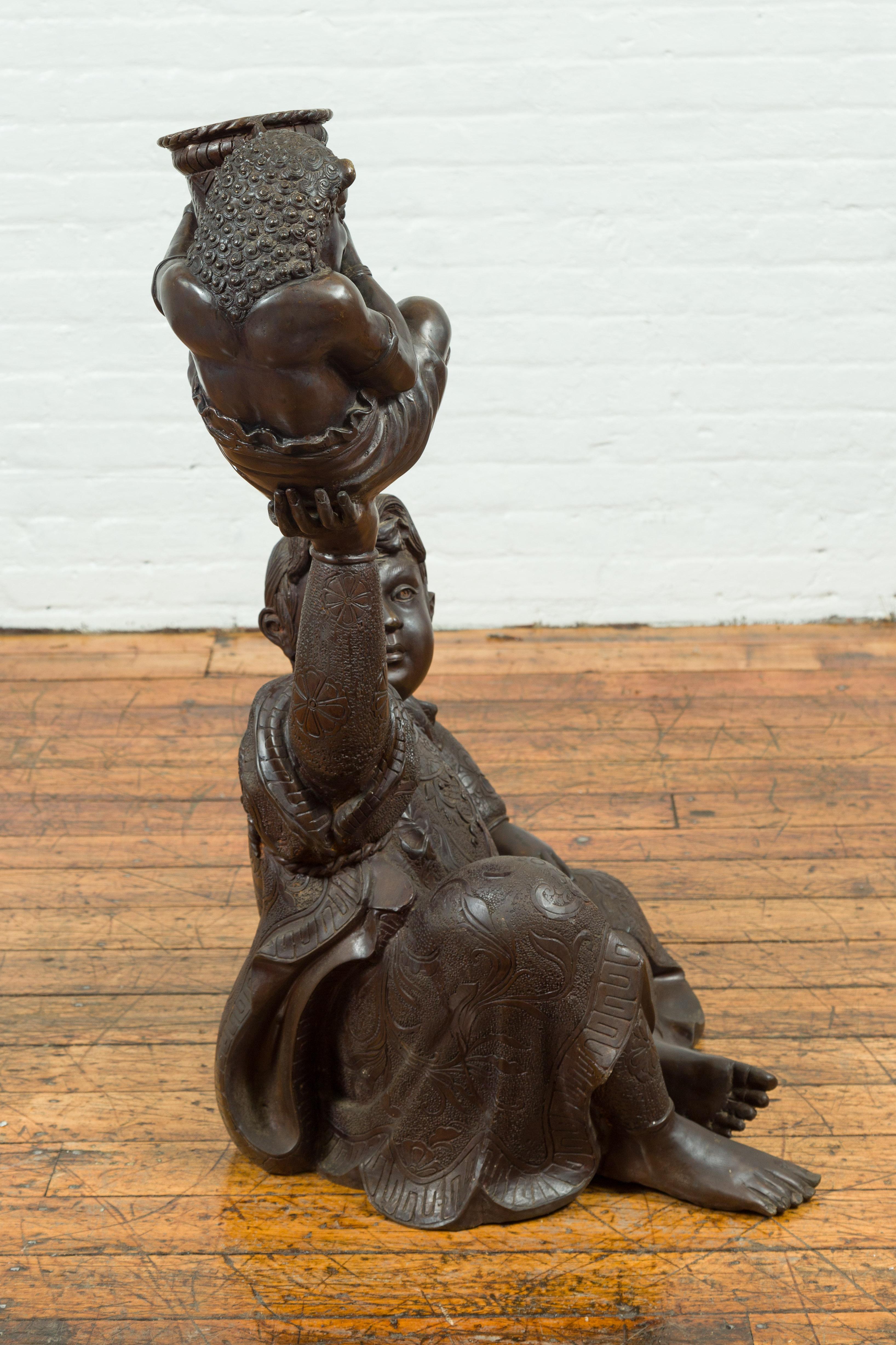 Japanese Style Bronze Sculpture of a Seated Woman Holding a Mythical Creature 6