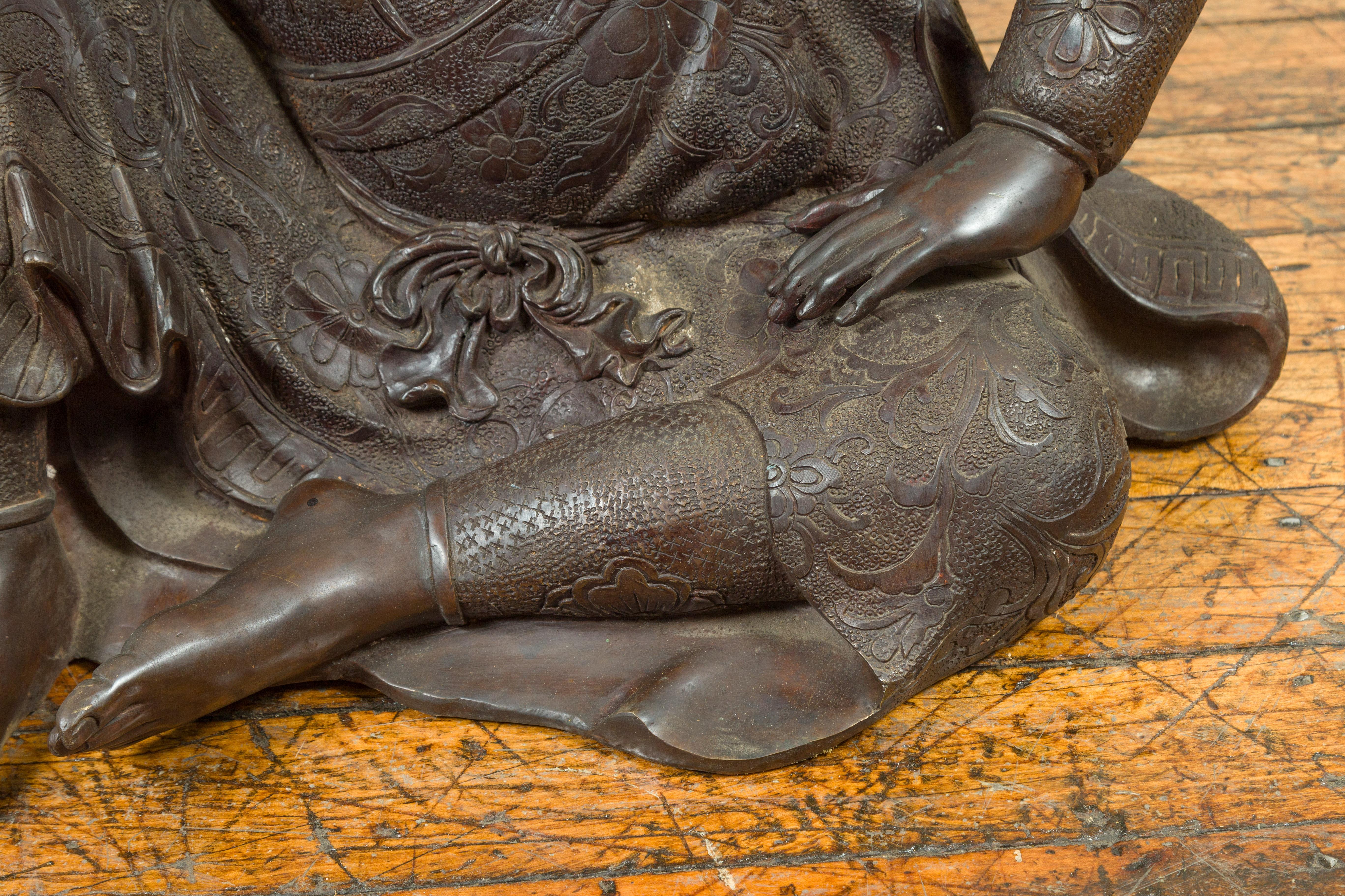 Japanese Style Bronze Sculpture of a Seated Woman Holding a Mythical Creature 1