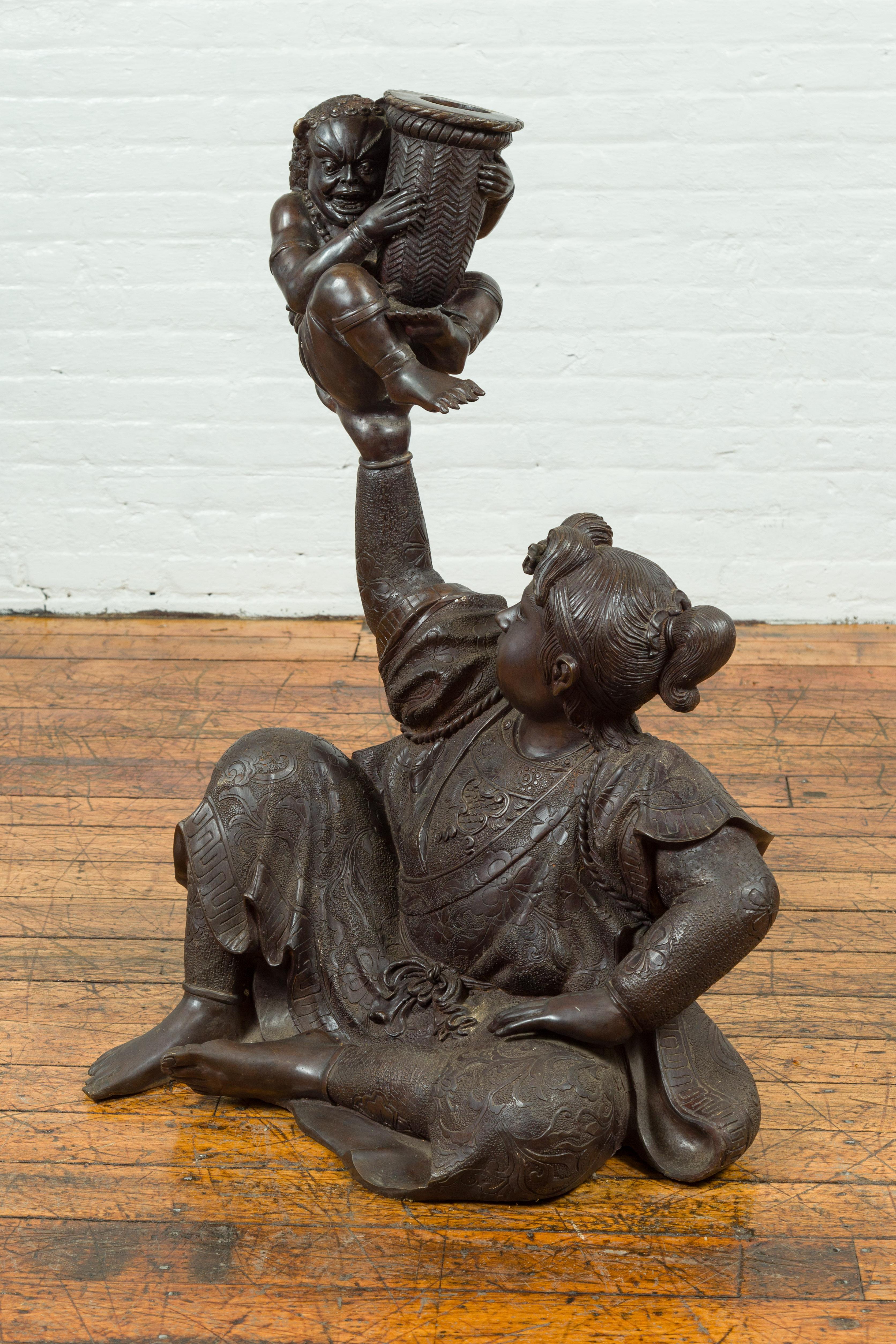 Japanese Style Bronze Sculpture of a Seated Woman Holding a Mythical Creature 3