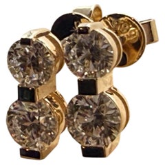 Japanese style diamond earrings 14KT gold screw backs modern styel stud earrings