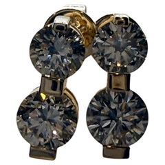 Japanese style diamond earrings 14KT gold screw backs modern styel stud earrings