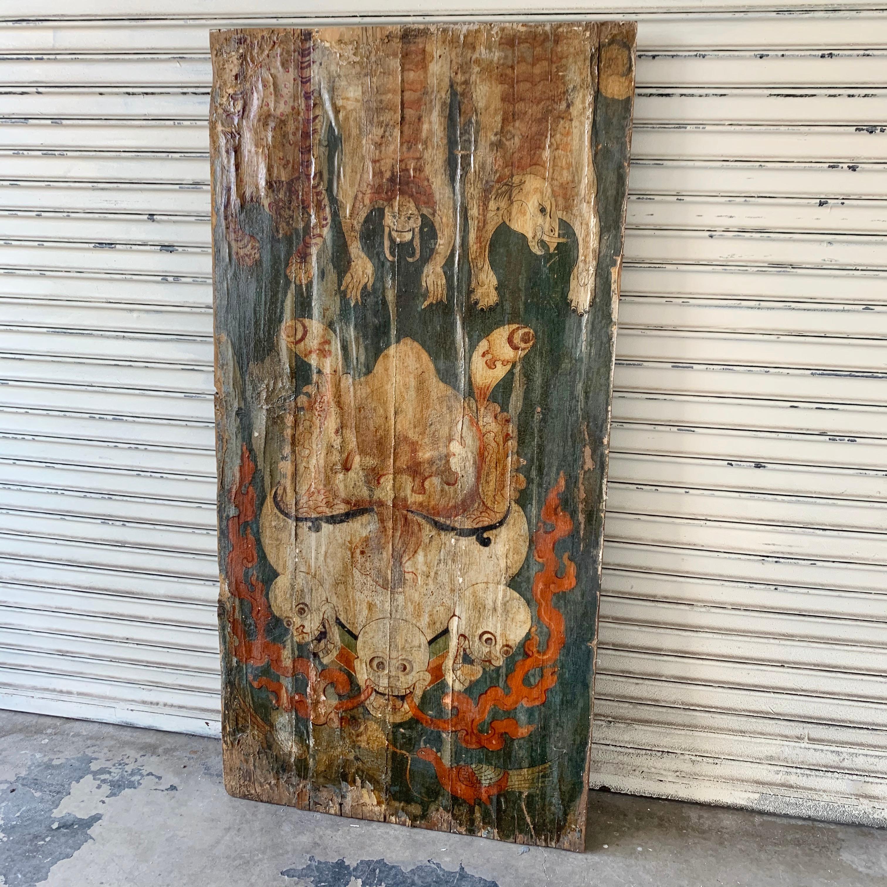 Unusual painting on fabric depicting a cauldron with skulls, birds, eyeballs, and tigers. Adhered to a wood panel. Great presence. Condition shown in photos. Large scale. Measures: 3 feet wide x 5.5 feet tall.