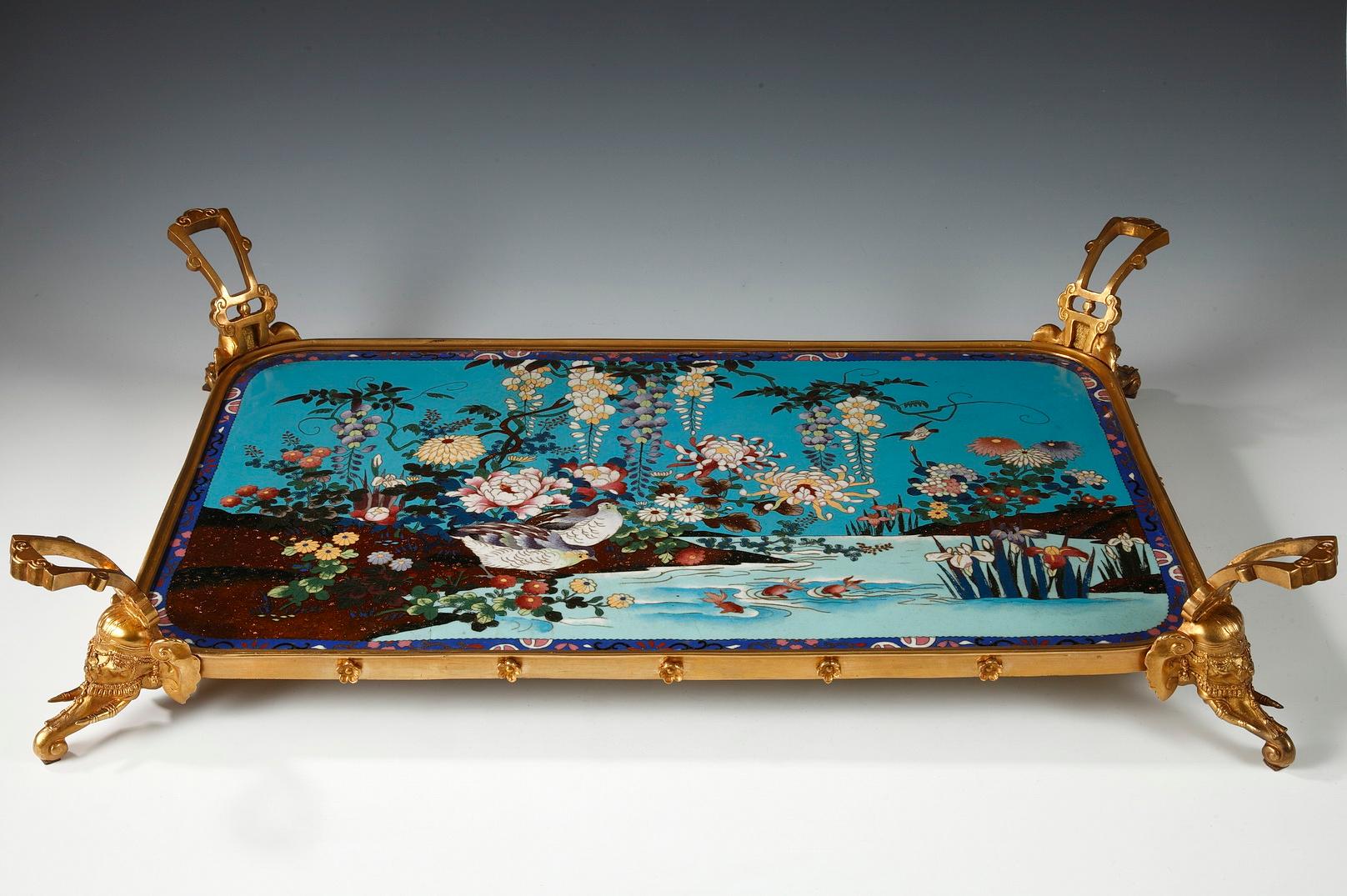 Rich landscape in cloisonné enamel on blue and brown background imitating Aventurine stone, attributed to L.C. Sevin and F. Barbedienne. The decor represents a river surrounded by wisterias, chrysanthemums, peonies, iris and reeds, led by birds and