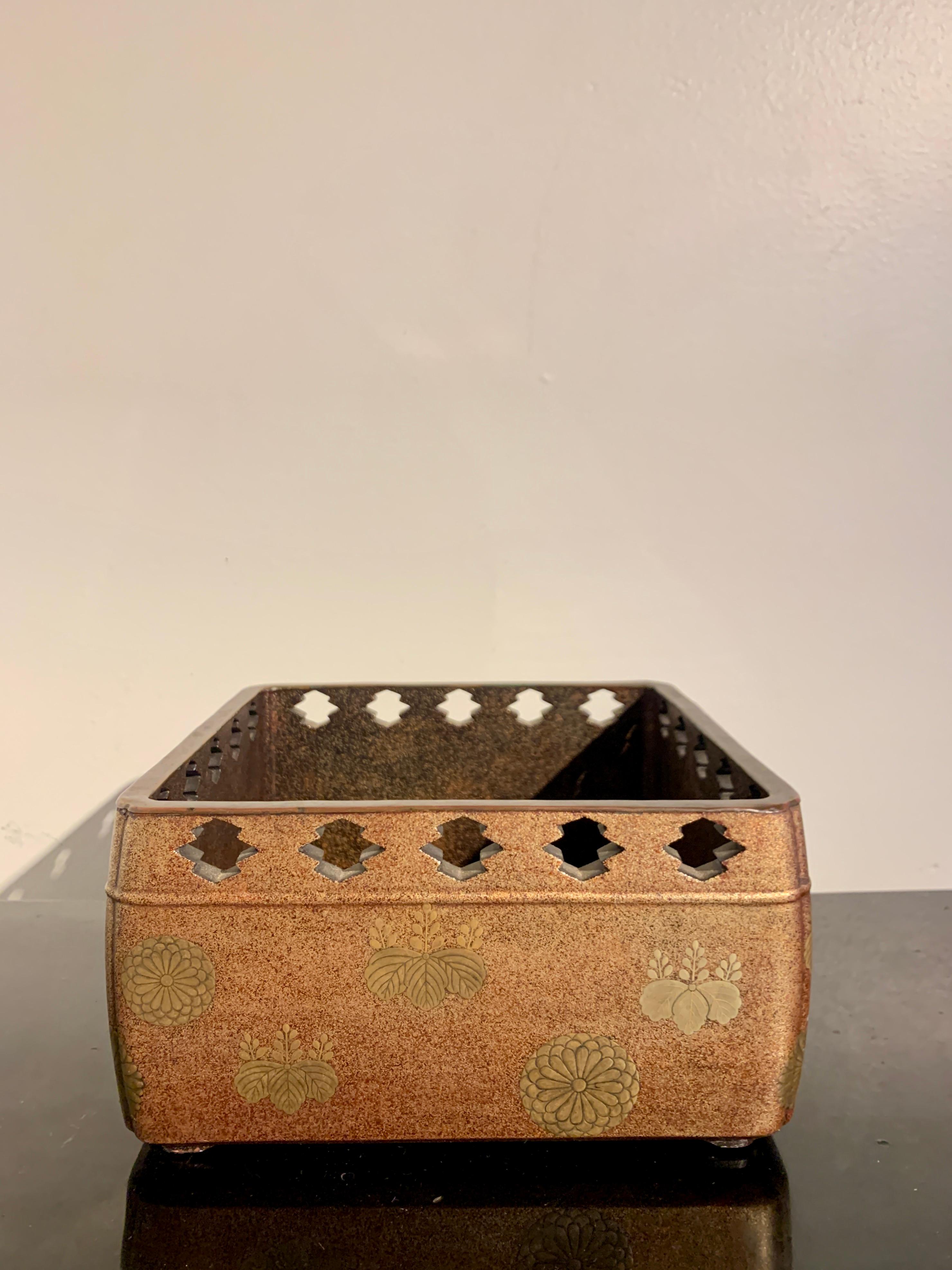 An attractive Japanese maki-e lacquer high sided carrying tray for smoking implements, tabako-bon, Meiji Period, mid to late 19th century, Japan.

The elegant lacquer tabako-bon tray of overall square shape, with rounded and indented corners, and