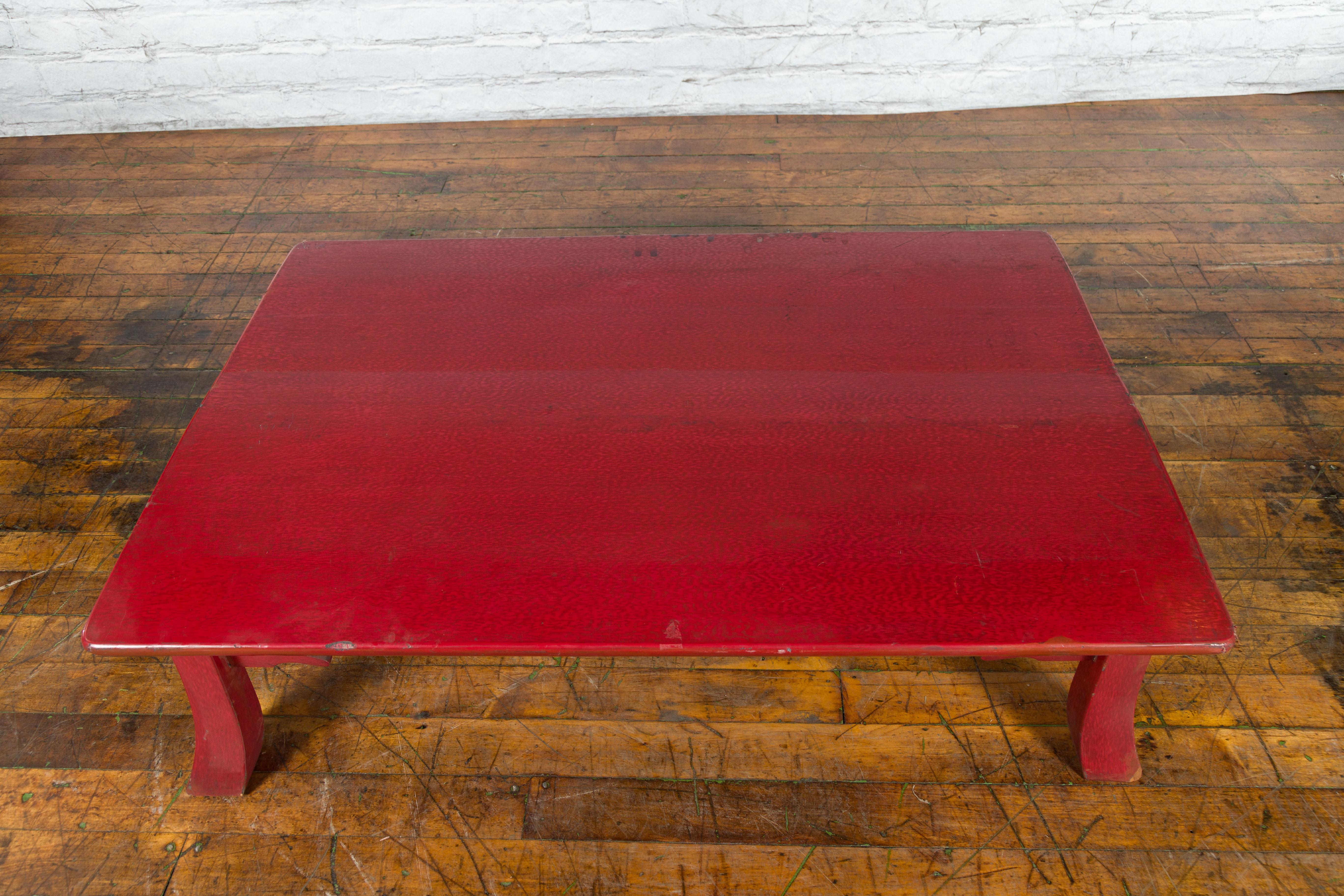 Wood Japanese Taishō Early 20th Century Red Lacquer Coffee Table with Carved Apron For Sale