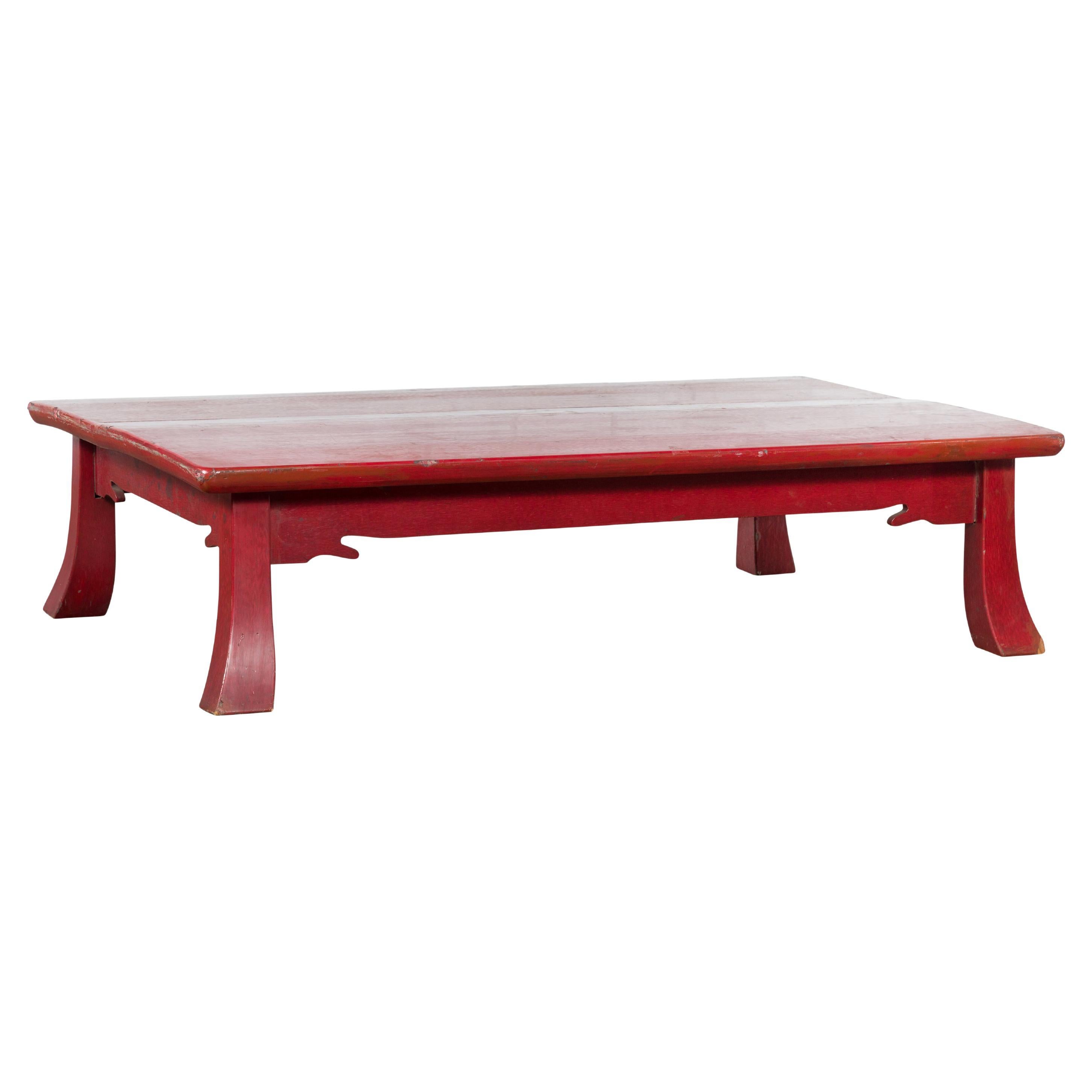 Japanese Taishō Early 20th Century Red Lacquer Coffee Table with Carved Apron For Sale