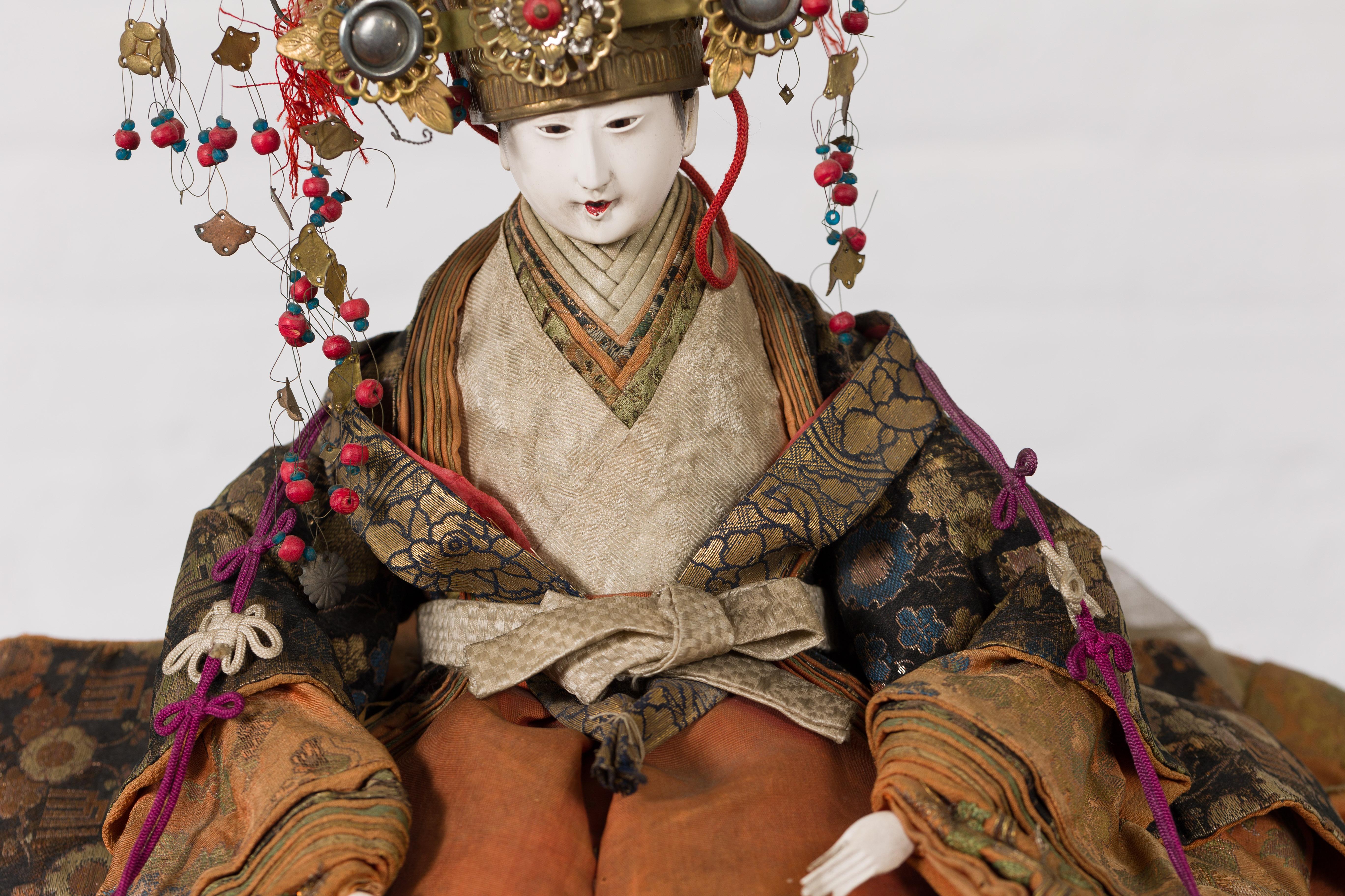 Japanese Taisho Period Sitting Doll with Silk Clothing and Ornate Headdress In Good Condition For Sale In Yonkers, NY