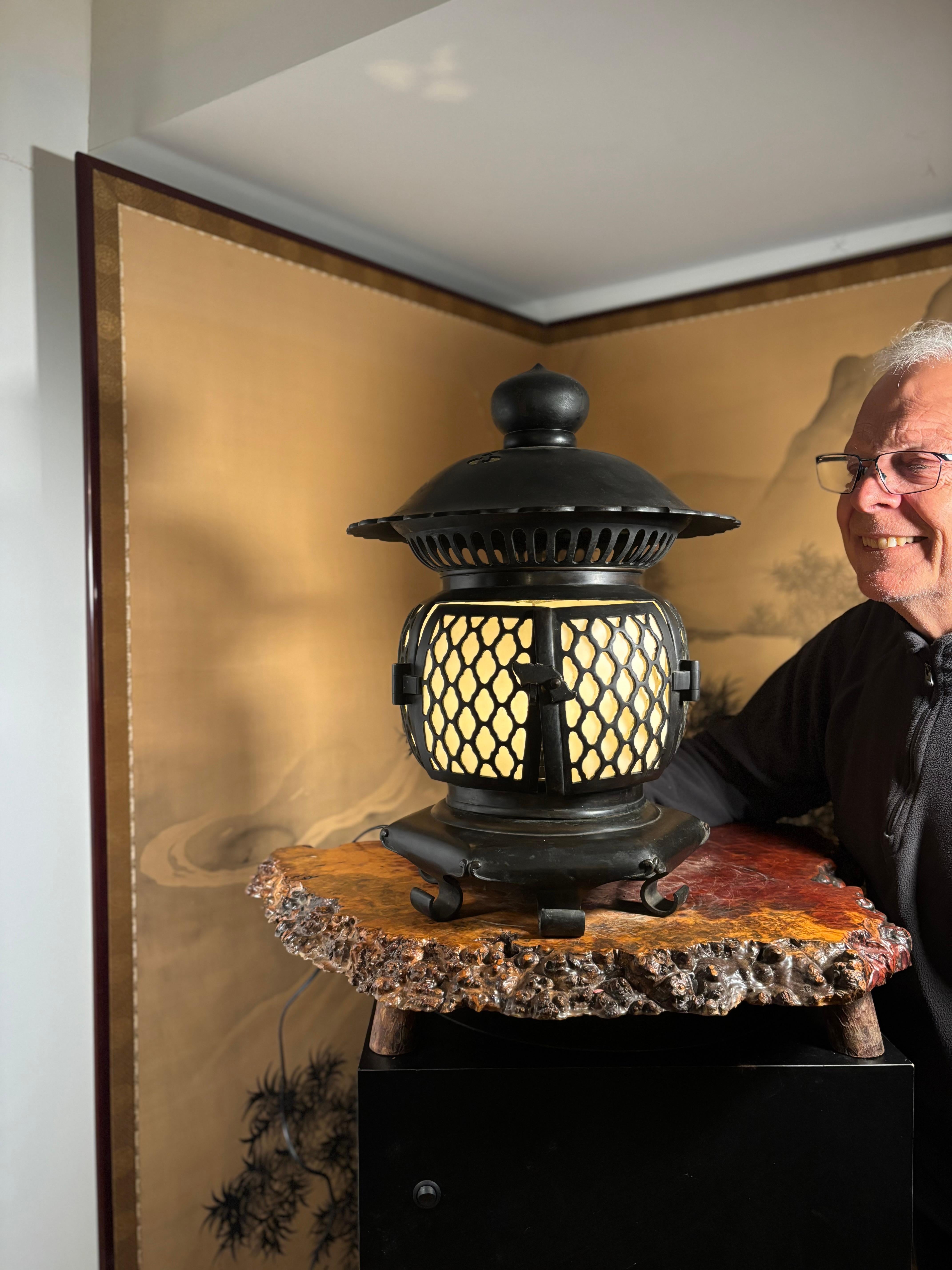  Special Antique Electrified Temple Lantern - Fine Interior Lighting Choice, One-Of-A-Kind

Japan, a handsome tall classic antique Temple Lantern enhanced with new interior paper and new electric light for your dramatic visual enjoyment.
