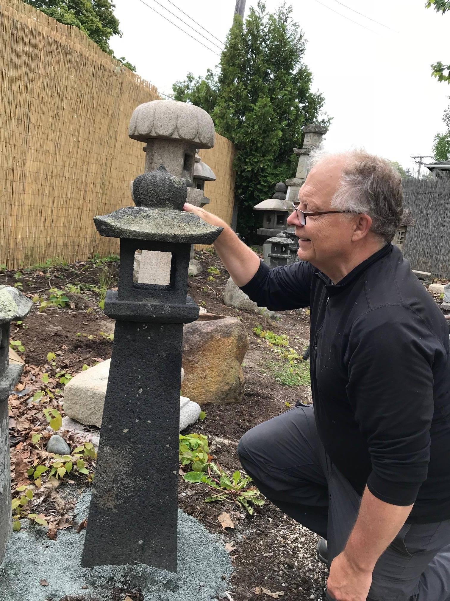 From our recent Japanese acquisitions travels.

An antique beauty with a handsome dark black patina, 31 inches tall.

Japan, a fine pathway stone lantern with beautifully lichen and patina from great age

They work especially well at night with an