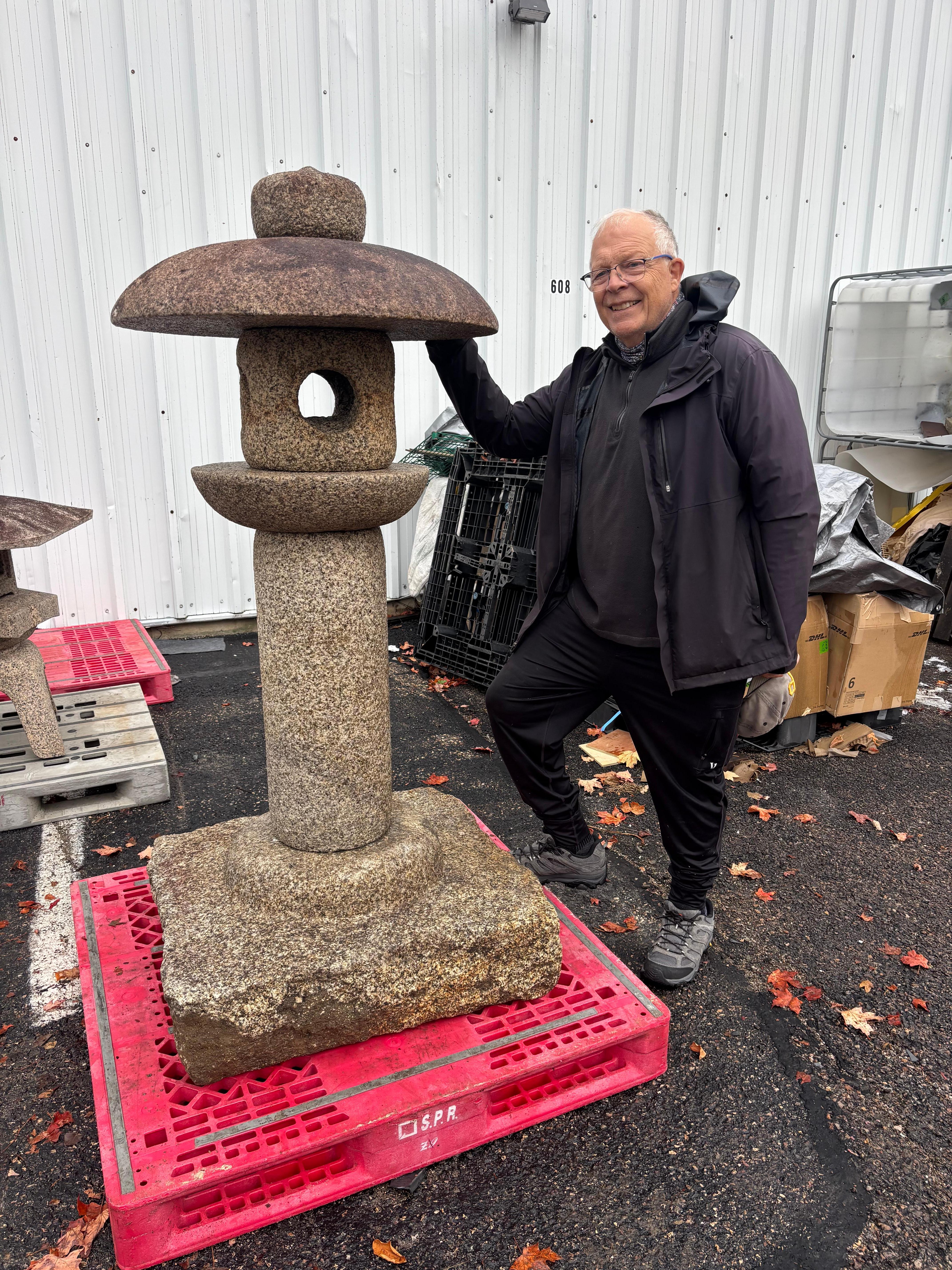Unusual handsome round top lantern in a contemporary design- first we have seen.

Please view our video.

A handsome and elegant smooth round top
 form  granite stone lantern with a lovely and dramatic slim organic natural pole base Sao topped by a