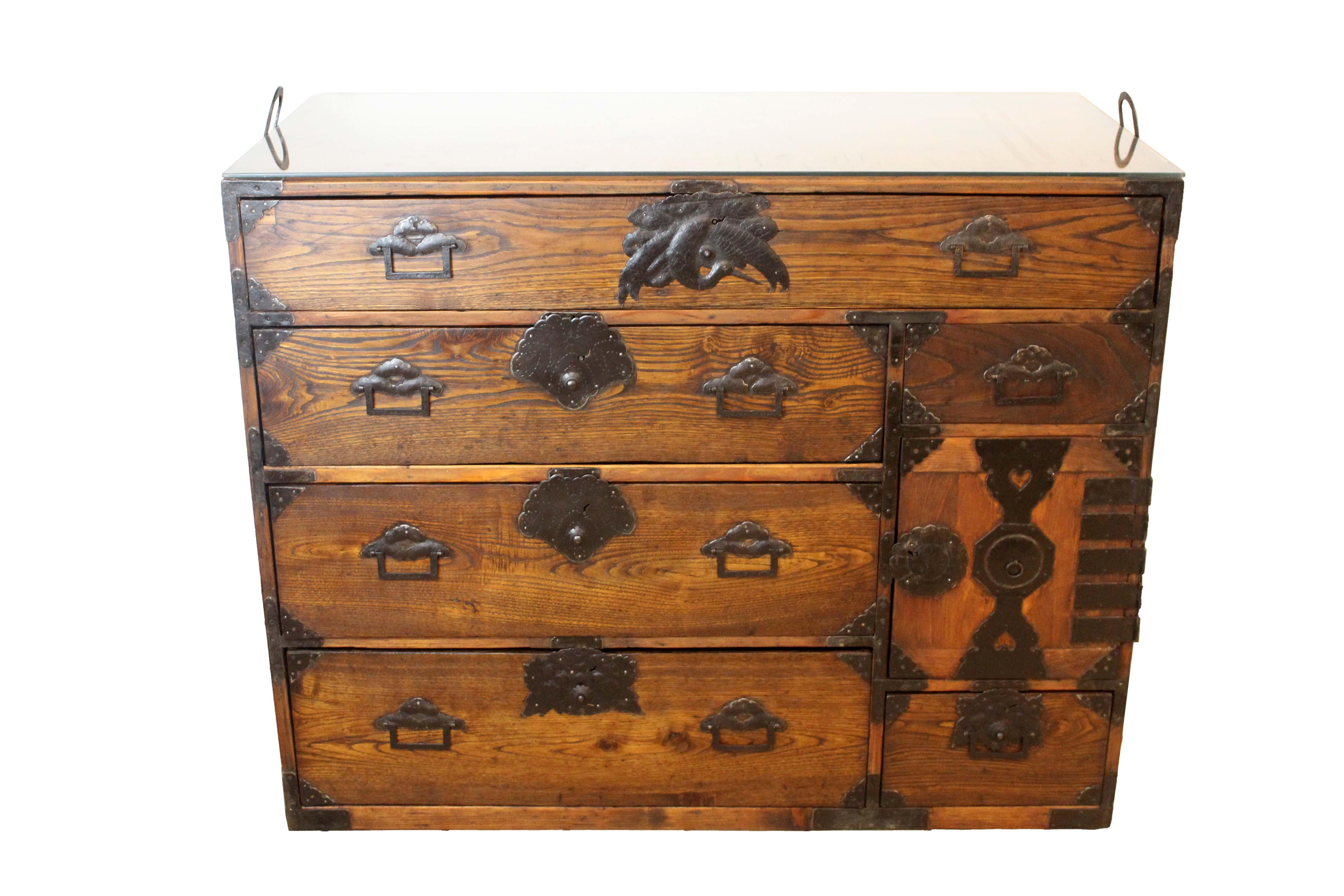 For your consideration is this stunning example of a Japanese Tansu Chest from the Taisho Period made of Keyaki Wood w/ Moko Handles. Dimensions: 43